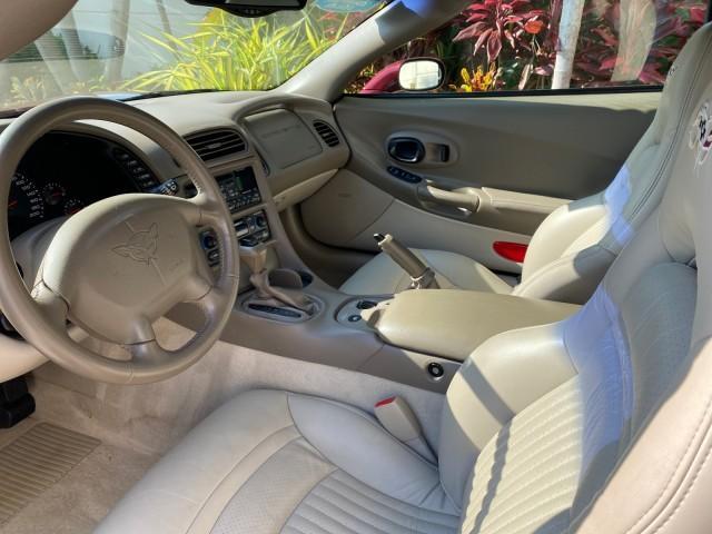 2003 50th Anniversary Red /Light Oak Chevrolet Corvette 50TH CONVERTIBLE LOW MILES 6,742 (1G1YY32G735) with an 5.7L Ls1 V8 SFI Engine engine, Automatic transmission, located at 4701 North Dixie Hwy, Pompano Beach, FL, 33064, (954) 422-2889, 26.240938, -80.123474 - OUR WEBPAGE FLORIDACARS1.COM HAS OVER 100 PHOTOS AND FREE CARFAX LINK 2003 Chevrolet Corvette 50th Anniversary Convertible 5.7L V8 F OHV Gasoline 25 MPG Rear Wheel Drive Features ABS Brakes Air Conditioning Alloy Wheels AM/FM Stereo Automatic Transmission BOSE Sound System CD Audio Cruise Control He- Photo#69