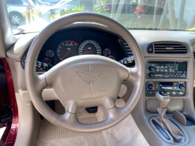 2003 50th Anniversary Red /Light Oak Chevrolet Corvette 50TH CONVERTIBLE LOW MILES 6,742 (1G1YY32G735) with an 5.7L Ls1 V8 SFI Engine engine, Automatic transmission, located at 4701 North Dixie Hwy, Pompano Beach, FL, 33064, (954) 422-2889, 26.240938, -80.123474 - OUR WEBPAGE FLORIDACARS1.COM HAS OVER 100 PHOTOS AND FREE CARFAX LINK 2003 Chevrolet Corvette 50th Anniversary Convertible 5.7L V8 F OHV Gasoline 25 MPG Rear Wheel Drive Features ABS Brakes Air Conditioning Alloy Wheels AM/FM Stereo Automatic Transmission BOSE Sound System CD Audio Cruise Control He- Photo#72