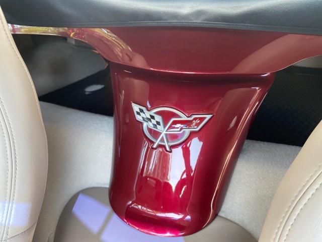 2003 50th Anniversary Red /Light Oak Chevrolet Corvette 50TH CONVERTIBLE LOW MILES 6,742 (1G1YY32G735) with an 5.7L Ls1 V8 SFI Engine engine, Automatic transmission, located at 4701 North Dixie Hwy, Pompano Beach, FL, 33064, (954) 422-2889, 26.240938, -80.123474 - OUR WEBPAGE FLORIDACARS1.COM HAS OVER 100 PHOTOS AND FREE CARFAX LINK 2003 Chevrolet Corvette 50th Anniversary Convertible 5.7L V8 F OHV Gasoline 25 MPG Rear Wheel Drive Features ABS Brakes Air Conditioning Alloy Wheels AM/FM Stereo Automatic Transmission BOSE Sound System CD Audio Cruise Control He- Photo#85