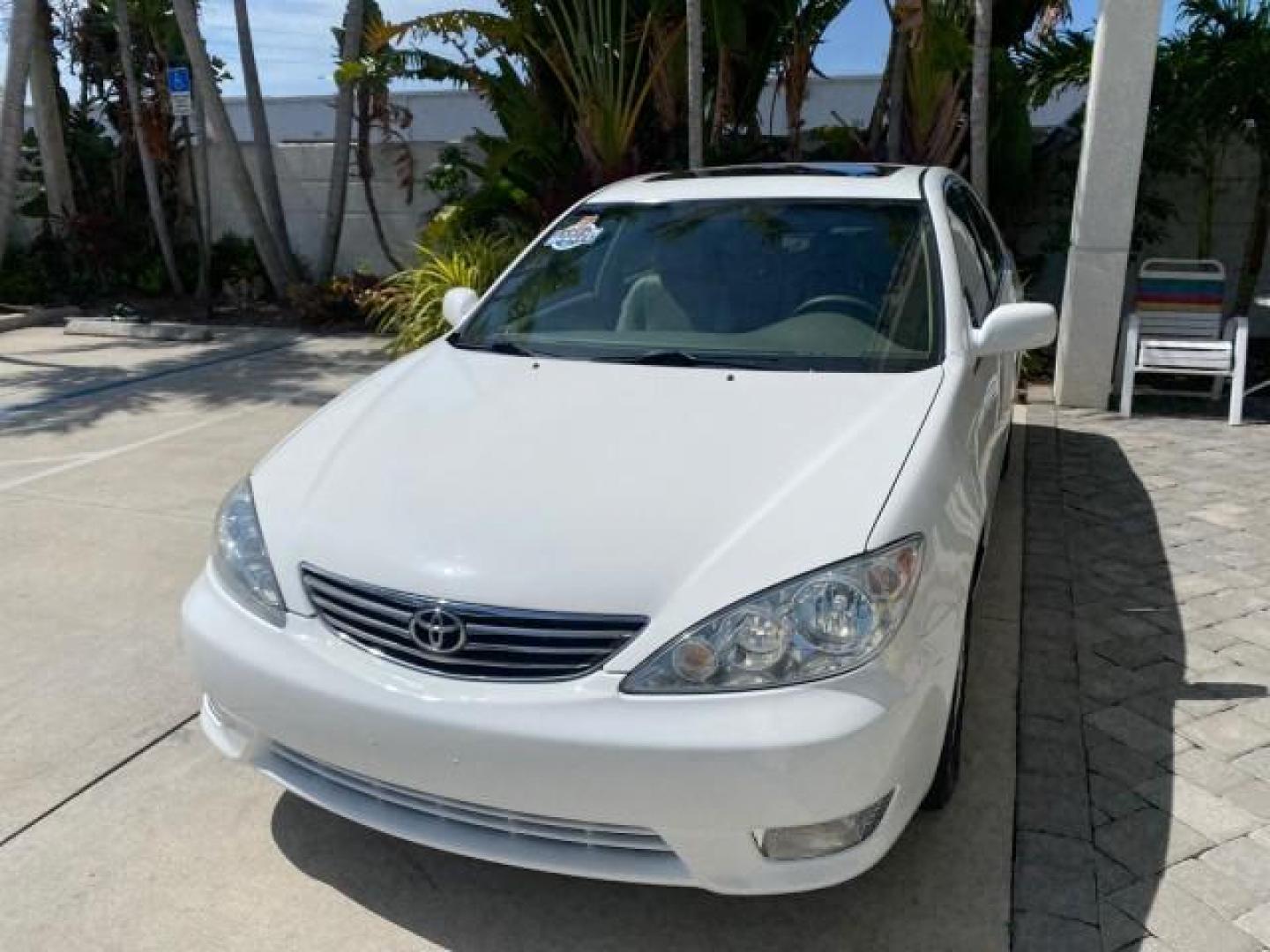 2006 Super White /Taupe Toyota Camry XLE V6 LOW MILES 65,439 (4T1BF30K76U) with an 3.0L DOHC SEFI 24-Valve V6 Engine engine, Automatic transmission, located at 4701 North Dixie Hwy, Pompano Beach, FL, 33064, (954) 422-2889, 26.240938, -80.123474 - OUR WEBPAGE FLORIDACARS1.COM HAS OVER 100 PHOTOS AND FREE CARFAX LINK 2006 Toyota Camry XLE V6 1 OWNER Sedan 4 DR 3.0L V6 F DOHC 24V Gasoline 29 MPG Front Wheel Drive Features ABS Brakes Air Conditioning Alloy Wheels AM/FM Stereo Automatic Transmission Cassette Player CD Audio Cruise Control JBL Sou- Photo#3