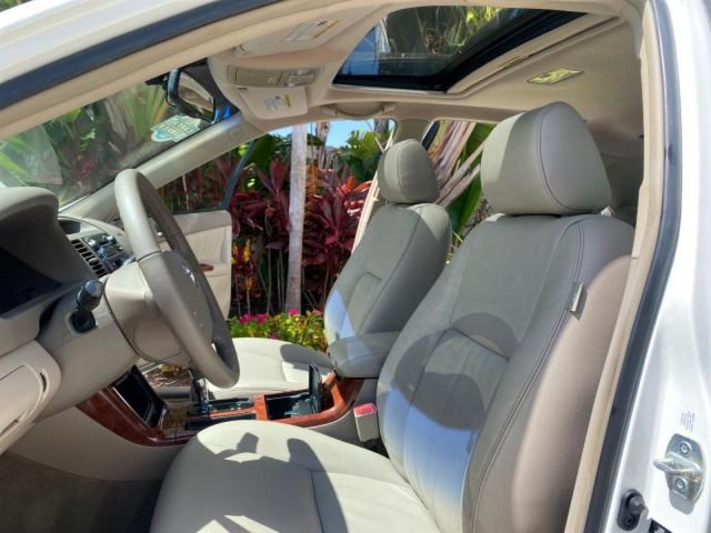 2006 Super White /Taupe Toyota Camry XLE V6 LOW MILES 65,439 (4T1BF30K76U) with an 3.0L DOHC SEFI 24-Valve V6 Engine engine, Automatic transmission, located at 4701 North Dixie Hwy, Pompano Beach, FL, 33064, (954) 422-2889, 26.240938, -80.123474 - OUR WEBPAGE FLORIDACARS1.COM HAS OVER 100 PHOTOS AND FREE CARFAX LINK 2006 Toyota Camry XLE V6 1 OWNER Sedan 4 DR 3.0L V6 F DOHC 24V Gasoline 29 MPG Front Wheel Drive Features ABS Brakes Air Conditioning Alloy Wheels AM/FM Stereo Automatic Transmission Cassette Player CD Audio Cruise Control JBL Sou- Photo#10