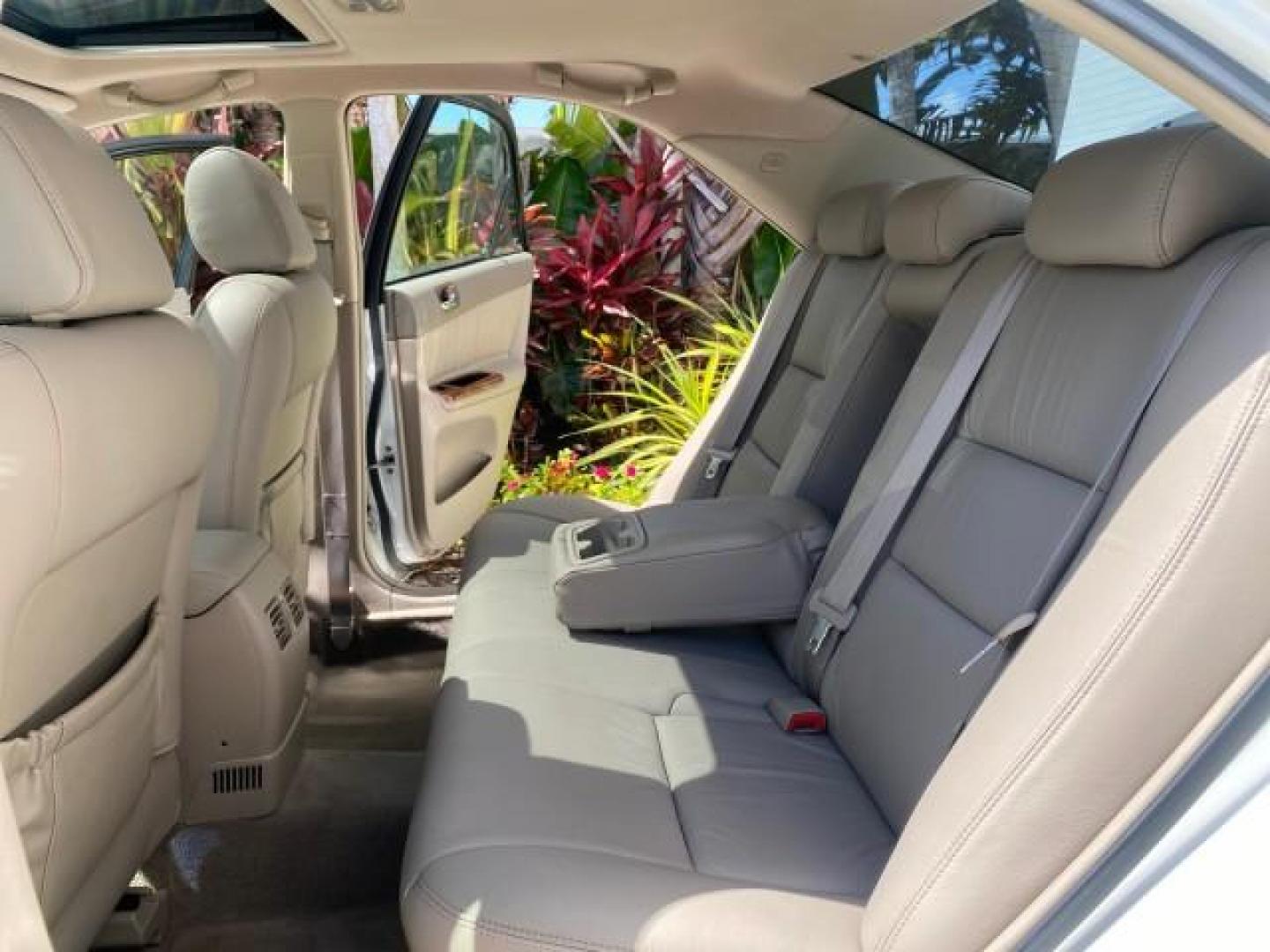2006 Super White /Taupe Toyota Camry XLE V6 LOW MILES 65,439 (4T1BF30K76U) with an 3.0L DOHC SEFI 24-Valve V6 Engine engine, Automatic transmission, located at 4701 North Dixie Hwy, Pompano Beach, FL, 33064, (954) 422-2889, 26.240938, -80.123474 - OUR WEBPAGE FLORIDACARS1.COM HAS OVER 100 PHOTOS AND FREE CARFAX LINK 2006 Toyota Camry XLE V6 1 OWNER Sedan 4 DR 3.0L V6 F DOHC 24V Gasoline 29 MPG Front Wheel Drive Features ABS Brakes Air Conditioning Alloy Wheels AM/FM Stereo Automatic Transmission Cassette Player CD Audio Cruise Control JBL Sou- Photo#14
