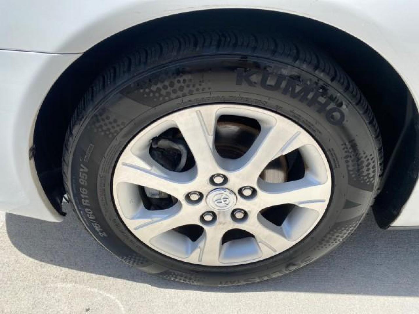 2006 Super White /Taupe Toyota Camry XLE V6 LOW MILES 65,439 (4T1BF30K76U) with an 3.0L DOHC SEFI 24-Valve V6 Engine engine, Automatic transmission, located at 4701 North Dixie Hwy, Pompano Beach, FL, 33064, (954) 422-2889, 26.240938, -80.123474 - OUR WEBPAGE FLORIDACARS1.COM HAS OVER 100 PHOTOS AND FREE CARFAX LINK 2006 Toyota Camry XLE V6 1 OWNER Sedan 4 DR 3.0L V6 F DOHC 24V Gasoline 29 MPG Front Wheel Drive Features ABS Brakes Air Conditioning Alloy Wheels AM/FM Stereo Automatic Transmission Cassette Player CD Audio Cruise Control JBL Sou- Photo#19