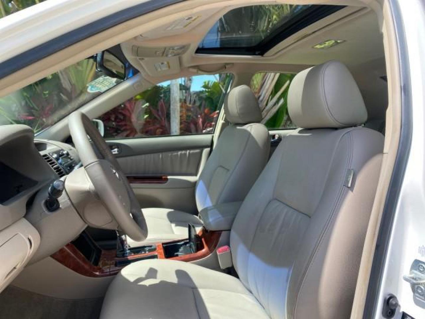 2006 Super White /Taupe Toyota Camry XLE V6 LOW MILES 65,439 (4T1BF30K76U) with an 3.0L DOHC SEFI 24-Valve V6 Engine engine, Automatic transmission, located at 4701 North Dixie Hwy, Pompano Beach, FL, 33064, (954) 422-2889, 26.240938, -80.123474 - OUR WEBPAGE FLORIDACARS1.COM HAS OVER 100 PHOTOS AND FREE CARFAX LINK 2006 Toyota Camry XLE V6 1 OWNER Sedan 4 DR 3.0L V6 F DOHC 24V Gasoline 29 MPG Front Wheel Drive Features ABS Brakes Air Conditioning Alloy Wheels AM/FM Stereo Automatic Transmission Cassette Player CD Audio Cruise Control JBL Sou- Photo#42