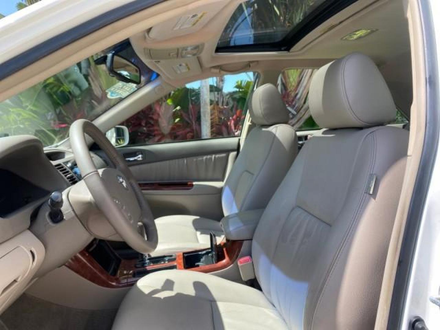 2006 Super White /Taupe Toyota Camry XLE V6 LOW MILES 65,439 (4T1BF30K76U) with an 3.0L DOHC SEFI 24-Valve V6 Engine engine, Automatic transmission, located at 4701 North Dixie Hwy, Pompano Beach, FL, 33064, (954) 422-2889, 26.240938, -80.123474 - OUR WEBPAGE FLORIDACARS1.COM HAS OVER 100 PHOTOS AND FREE CARFAX LINK 2006 Toyota Camry XLE V6 1 OWNER Sedan 4 DR 3.0L V6 F DOHC 24V Gasoline 29 MPG Front Wheel Drive Features ABS Brakes Air Conditioning Alloy Wheels AM/FM Stereo Automatic Transmission Cassette Player CD Audio Cruise Control JBL Sou- Photo#43