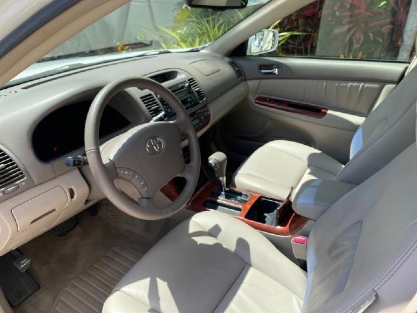 2006 Super White /Taupe Toyota Camry XLE V6 LOW MILES 65,439 (4T1BF30K76U) with an 3.0L DOHC SEFI 24-Valve V6 Engine engine, Automatic transmission, located at 4701 North Dixie Hwy, Pompano Beach, FL, 33064, (954) 422-2889, 26.240938, -80.123474 - OUR WEBPAGE FLORIDACARS1.COM HAS OVER 100 PHOTOS AND FREE CARFAX LINK 2006 Toyota Camry XLE V6 1 OWNER Sedan 4 DR 3.0L V6 F DOHC 24V Gasoline 29 MPG Front Wheel Drive Features ABS Brakes Air Conditioning Alloy Wheels AM/FM Stereo Automatic Transmission Cassette Player CD Audio Cruise Control JBL Sou- Photo#45
