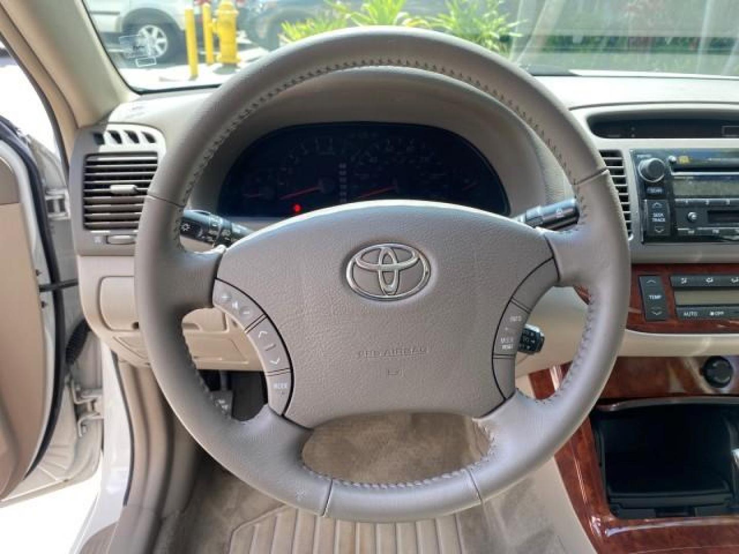 2006 Super White /Taupe Toyota Camry XLE V6 LOW MILES 65,439 (4T1BF30K76U) with an 3.0L DOHC SEFI 24-Valve V6 Engine engine, Automatic transmission, located at 4701 North Dixie Hwy, Pompano Beach, FL, 33064, (954) 422-2889, 26.240938, -80.123474 - OUR WEBPAGE FLORIDACARS1.COM HAS OVER 100 PHOTOS AND FREE CARFAX LINK 2006 Toyota Camry XLE V6 1 OWNER Sedan 4 DR 3.0L V6 F DOHC 24V Gasoline 29 MPG Front Wheel Drive Features ABS Brakes Air Conditioning Alloy Wheels AM/FM Stereo Automatic Transmission Cassette Player CD Audio Cruise Control JBL Sou- Photo#48