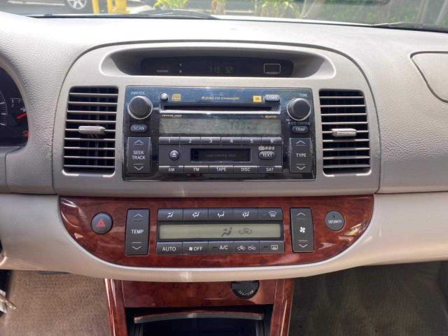 2006 Super White /Taupe Toyota Camry XLE V6 LOW MILES 65,439 (4T1BF30K76U) with an 3.0L DOHC SEFI 24-Valve V6 Engine engine, Automatic transmission, located at 4701 North Dixie Hwy, Pompano Beach, FL, 33064, (954) 422-2889, 26.240938, -80.123474 - OUR WEBPAGE FLORIDACARS1.COM HAS OVER 100 PHOTOS AND FREE CARFAX LINK 2006 Toyota Camry XLE V6 1 OWNER Sedan 4 DR 3.0L V6 F DOHC 24V Gasoline 29 MPG Front Wheel Drive Features ABS Brakes Air Conditioning Alloy Wheels AM/FM Stereo Automatic Transmission Cassette Player CD Audio Cruise Control JBL Sou- Photo#57
