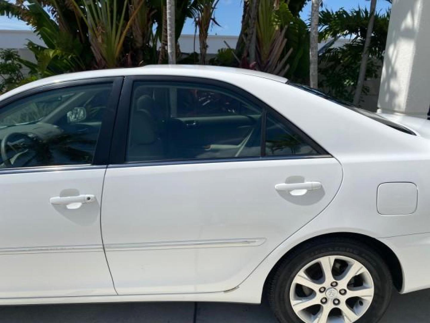 2006 Super White /Taupe Toyota Camry XLE V6 LOW MILES 65,439 (4T1BF30K76U) with an 3.0L DOHC SEFI 24-Valve V6 Engine engine, Automatic transmission, located at 4701 North Dixie Hwy, Pompano Beach, FL, 33064, (954) 422-2889, 26.240938, -80.123474 - OUR WEBPAGE FLORIDACARS1.COM HAS OVER 100 PHOTOS AND FREE CARFAX LINK 2006 Toyota Camry XLE V6 1 OWNER Sedan 4 DR 3.0L V6 F DOHC 24V Gasoline 29 MPG Front Wheel Drive Features ABS Brakes Air Conditioning Alloy Wheels AM/FM Stereo Automatic Transmission Cassette Player CD Audio Cruise Control JBL Sou- Photo#74