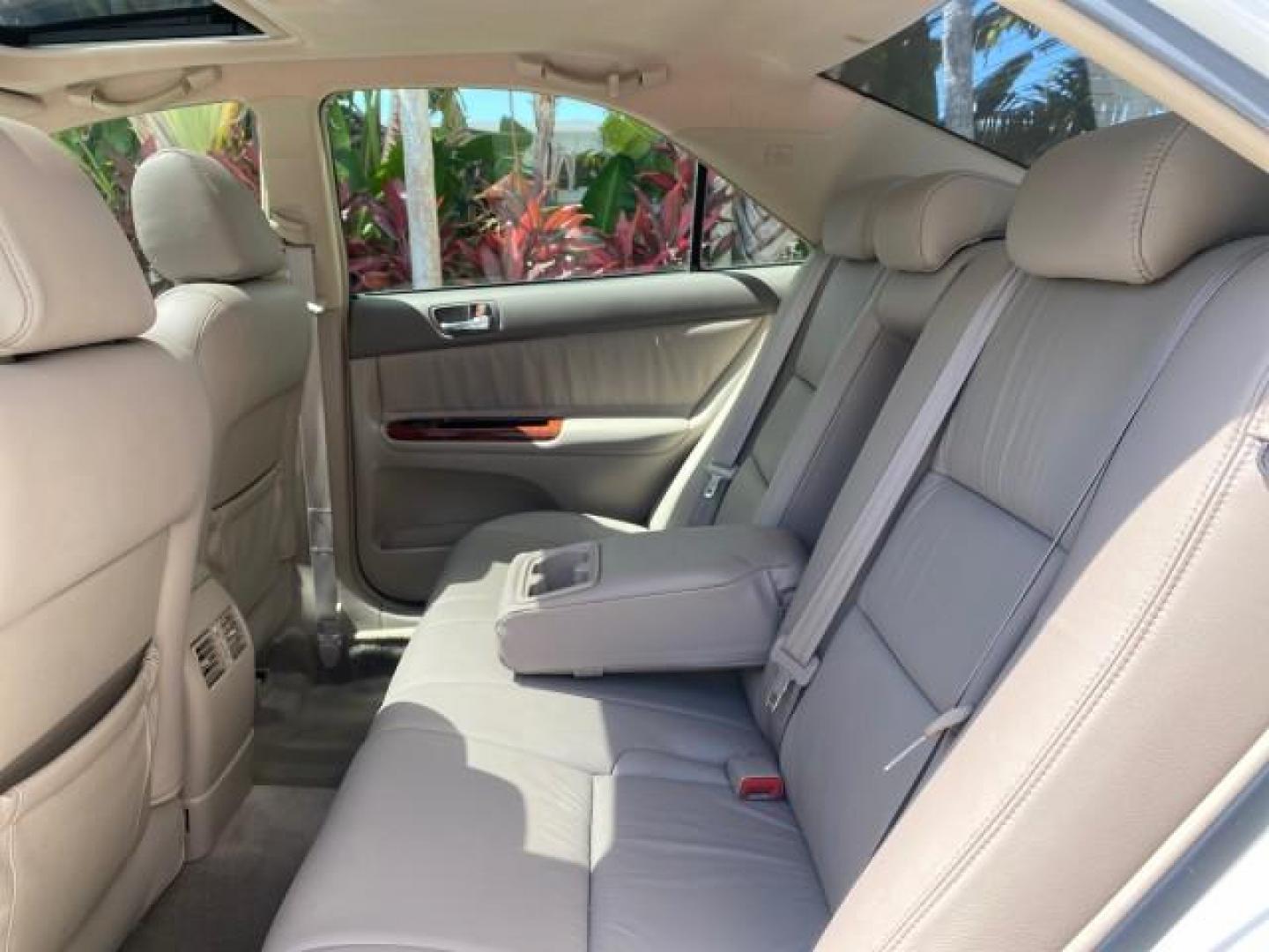 2006 Super White /Taupe Toyota Camry XLE V6 LOW MILES 65,439 (4T1BF30K76U) with an 3.0L DOHC SEFI 24-Valve V6 Engine engine, Automatic transmission, located at 4701 North Dixie Hwy, Pompano Beach, FL, 33064, (954) 422-2889, 26.240938, -80.123474 - OUR WEBPAGE FLORIDACARS1.COM HAS OVER 100 PHOTOS AND FREE CARFAX LINK 2006 Toyota Camry XLE V6 1 OWNER Sedan 4 DR 3.0L V6 F DOHC 24V Gasoline 29 MPG Front Wheel Drive Features ABS Brakes Air Conditioning Alloy Wheels AM/FM Stereo Automatic Transmission Cassette Player CD Audio Cruise Control JBL Sou- Photo#78