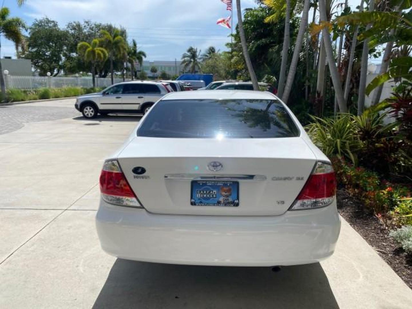 2006 Super White /Taupe Toyota Camry XLE V6 LOW MILES 65,439 (4T1BF30K76U) with an 3.0L DOHC SEFI 24-Valve V6 Engine engine, Automatic transmission, located at 4701 North Dixie Hwy, Pompano Beach, FL, 33064, (954) 422-2889, 26.240938, -80.123474 - OUR WEBPAGE FLORIDACARS1.COM HAS OVER 100 PHOTOS AND FREE CARFAX LINK 2006 Toyota Camry XLE V6 1 OWNER Sedan 4 DR 3.0L V6 F DOHC 24V Gasoline 29 MPG Front Wheel Drive Features ABS Brakes Air Conditioning Alloy Wheels AM/FM Stereo Automatic Transmission Cassette Player CD Audio Cruise Control JBL Sou- Photo#91