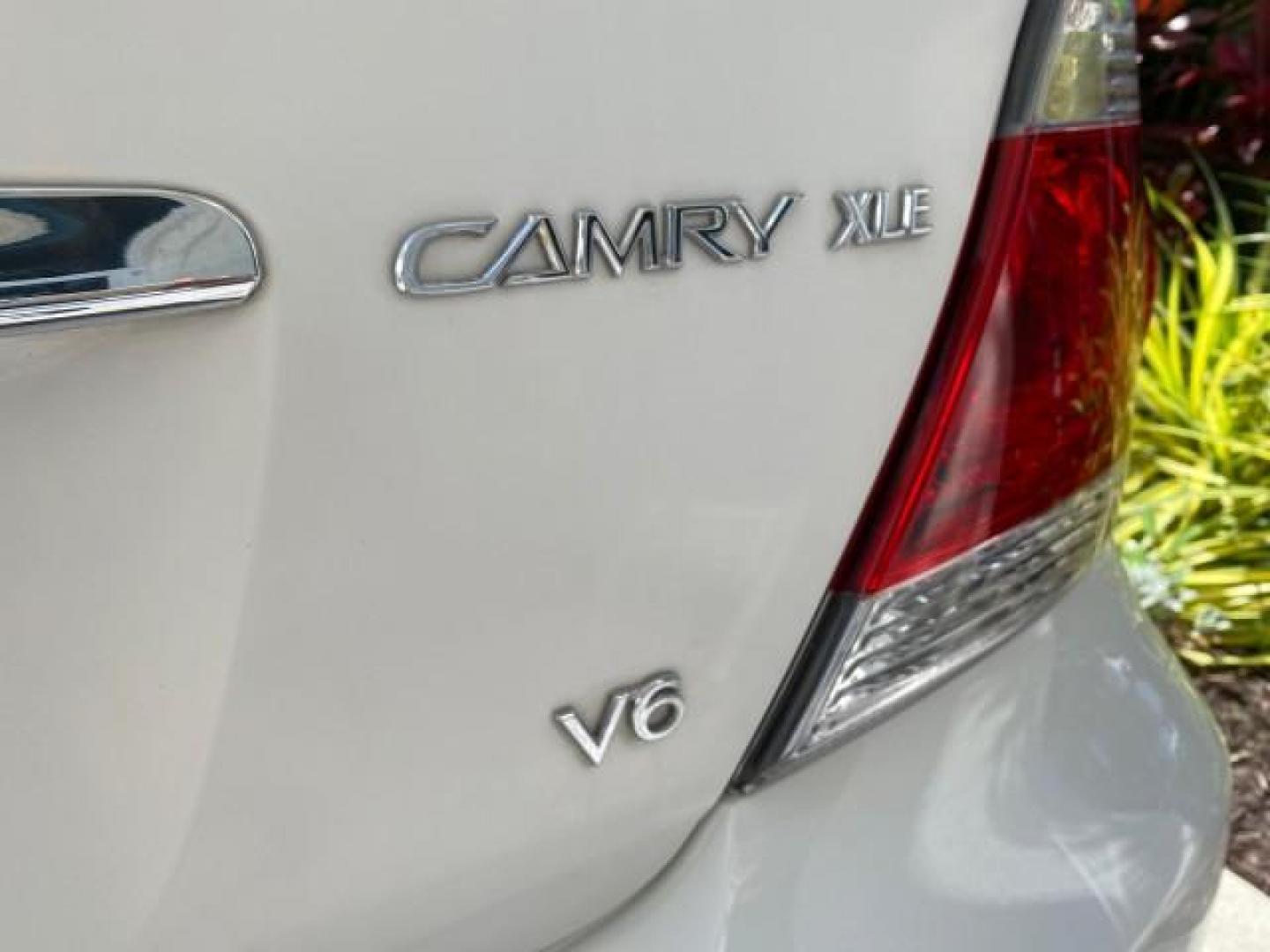 2006 Super White /Taupe Toyota Camry XLE V6 LOW MILES 65,439 (4T1BF30K76U) with an 3.0L DOHC SEFI 24-Valve V6 Engine engine, Automatic transmission, located at 4701 North Dixie Hwy, Pompano Beach, FL, 33064, (954) 422-2889, 26.240938, -80.123474 - OUR WEBPAGE FLORIDACARS1.COM HAS OVER 100 PHOTOS AND FREE CARFAX LINK 2006 Toyota Camry XLE V6 1 OWNER Sedan 4 DR 3.0L V6 F DOHC 24V Gasoline 29 MPG Front Wheel Drive Features ABS Brakes Air Conditioning Alloy Wheels AM/FM Stereo Automatic Transmission Cassette Player CD Audio Cruise Control JBL Sou- Photo#94