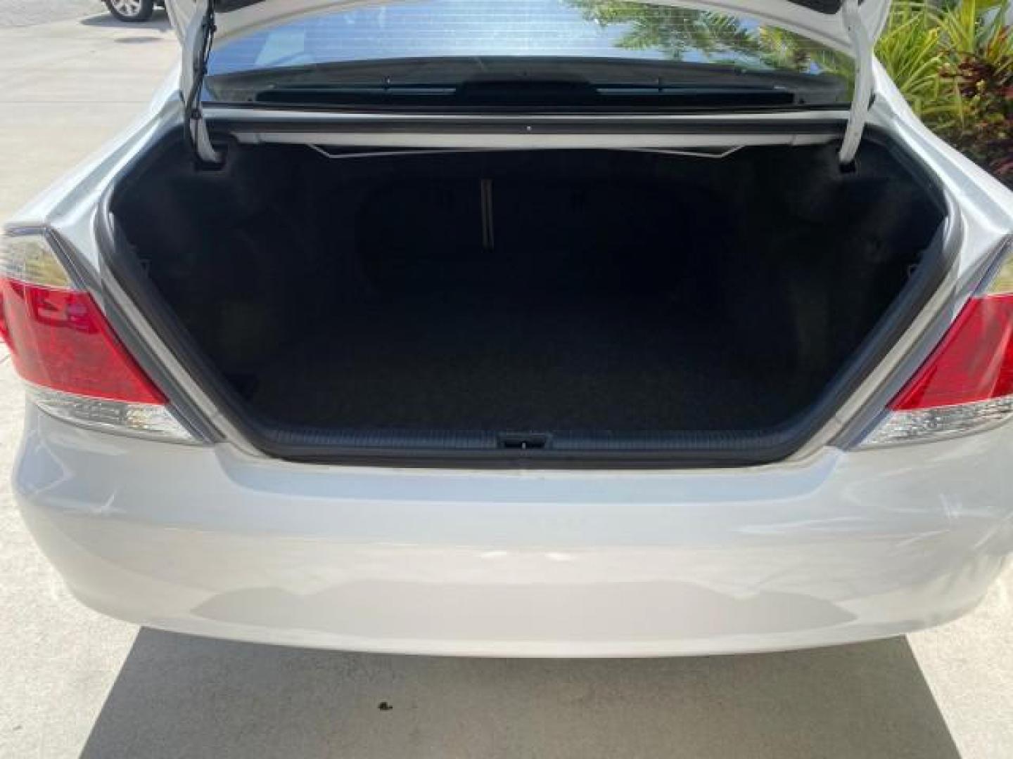 2006 Super White /Taupe Toyota Camry XLE V6 LOW MILES 65,439 (4T1BF30K76U) with an 3.0L DOHC SEFI 24-Valve V6 Engine engine, Automatic transmission, located at 4701 North Dixie Hwy, Pompano Beach, FL, 33064, (954) 422-2889, 26.240938, -80.123474 - OUR WEBPAGE FLORIDACARS1.COM HAS OVER 100 PHOTOS AND FREE CARFAX LINK 2006 Toyota Camry XLE V6 1 OWNER Sedan 4 DR 3.0L V6 F DOHC 24V Gasoline 29 MPG Front Wheel Drive Features ABS Brakes Air Conditioning Alloy Wheels AM/FM Stereo Automatic Transmission Cassette Player CD Audio Cruise Control JBL Sou- Photo#97