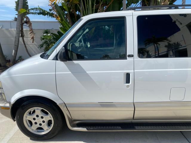 2005 Summit White /Medium Gray Chevrolet Astro Passenger LT LOW MILES 67,376 1 OWNER (1GNDM19X05B) with an 4.3L Vortec 4300 V6 MFI Engine engine, Automatic transmission, located at 4701 North Dixie Hwy, Pompano Beach, FL, 33064, (954) 422-2889, 26.240938, -80.123474 - OUR WEBPAGE FLORIDACARS1.COM HAS OVER 100 PHOTOS AND FREE CARFAX LINK 2005 Chevrolet Astro LT 1 OWNER Van 4.3L V6 F Gasoline 21 MPG Rear Wheel Drive Features ABS Brakes Air Conditioning Alloy Wheels AM/FM Stereo Automatic Transmission Barn Doors Cassette Player CD Audio Cloth Seats Cruise Control Fu- Photo#37