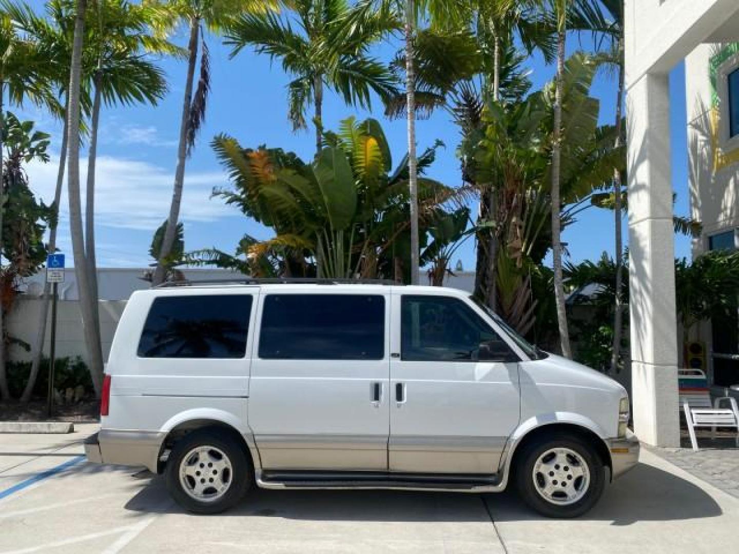 2005 Summit White /Medium Gray Chevrolet Astro Passenger LT LOW MILES 67,376 1 OWNER (1GNDM19X05B) with an 4.3L Vortec 4300 V6 MFI Engine engine, Automatic transmission, located at 4701 North Dixie Hwy, Pompano Beach, FL, 33064, (954) 422-2889, 26.240938, -80.123474 - OUR WEBPAGE FLORIDACARS1.COM HAS OVER 100 PHOTOS AND FREE CARFAX LINK 2005 Chevrolet Astro LT 1 OWNER Van 4.3L V6 F Gasoline 21 MPG Rear Wheel Drive Features ABS Brakes Air Conditioning Alloy Wheels AM/FM Stereo Automatic Transmission Barn Doors Cassette Player CD Audio Cloth Seats Cruise Control Fu- Photo#99