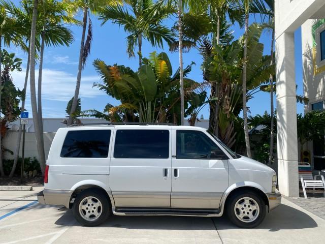 2005 Summit White /Medium Gray Chevrolet Astro Passenger LT LOW MILES 67,376 1 OWNER (1GNDM19X05B) with an 4.3L Vortec 4300 V6 MFI Engine engine, Automatic transmission, located at 4701 North Dixie Hwy, Pompano Beach, FL, 33064, (954) 422-2889, 26.240938, -80.123474 - OUR WEBPAGE FLORIDACARS1.COM HAS OVER 100 PHOTOS AND FREE CARFAX LINK 2005 Chevrolet Astro LT 1 OWNER Van 4.3L V6 F Gasoline 21 MPG Rear Wheel Drive Features ABS Brakes Air Conditioning Alloy Wheels AM/FM Stereo Automatic Transmission Barn Doors Cassette Player CD Audio Cloth Seats Cruise Control Fu- Photo#99