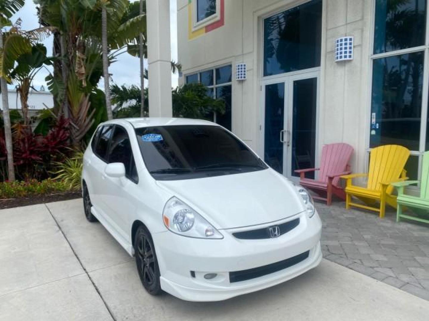 2007 Taffeta White /Black Honda Fit 37 MPG AUTO AC Sport LOW MILES 40,042 (JHMGD38687S) with an 1.5L SOHC PGM-FI 16-Valve VTEC I4 Engine engine, Automatic transmission, located at 4701 North Dixie Hwy, Pompano Beach, FL, 33064, (954) 422-2889, 26.240938, -80.123474 - OUR WEBPAGE FLORIDACARS1.COM HAS OVER 100 PHOTOS AND FREE CARFAX LINK 2007 Honda Fit Sport Hatchback 4 DR 1.5L I4 F SOHC Gasoline 37 MPG Front Wheel Drive Features ABS Brakes Air Conditioning Alloy Wheels AM/FM Stereo Automatic Transmission Auxiliary Audio Input CD Audio Cloth Seats Cruise Control O- Photo#1