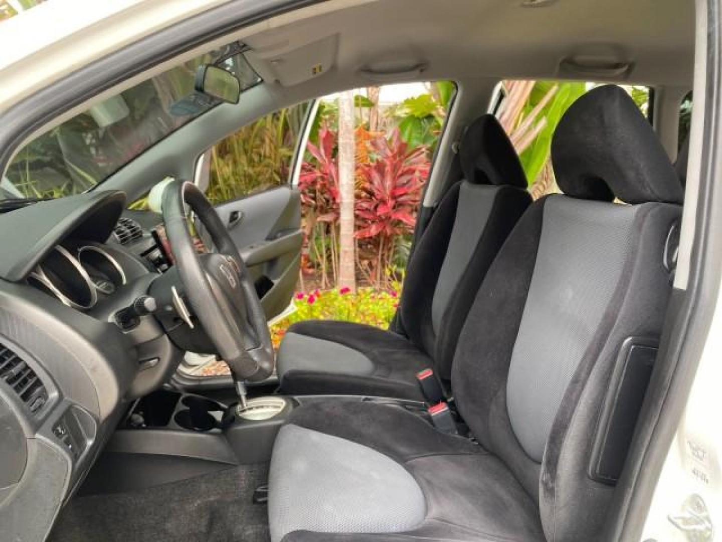 2007 Taffeta White /Black Honda Fit 37 MPG AUTO AC Sport LOW MILES 40,042 (JHMGD38687S) with an 1.5L SOHC PGM-FI 16-Valve VTEC I4 Engine engine, Automatic transmission, located at 4701 North Dixie Hwy, Pompano Beach, FL, 33064, (954) 422-2889, 26.240938, -80.123474 - OUR WEBPAGE FLORIDACARS1.COM HAS OVER 100 PHOTOS AND FREE CARFAX LINK 2007 Honda Fit Sport Hatchback 4 DR 1.5L I4 F SOHC Gasoline 37 MPG Front Wheel Drive Features ABS Brakes Air Conditioning Alloy Wheels AM/FM Stereo Automatic Transmission Auxiliary Audio Input CD Audio Cloth Seats Cruise Control O- Photo#10
