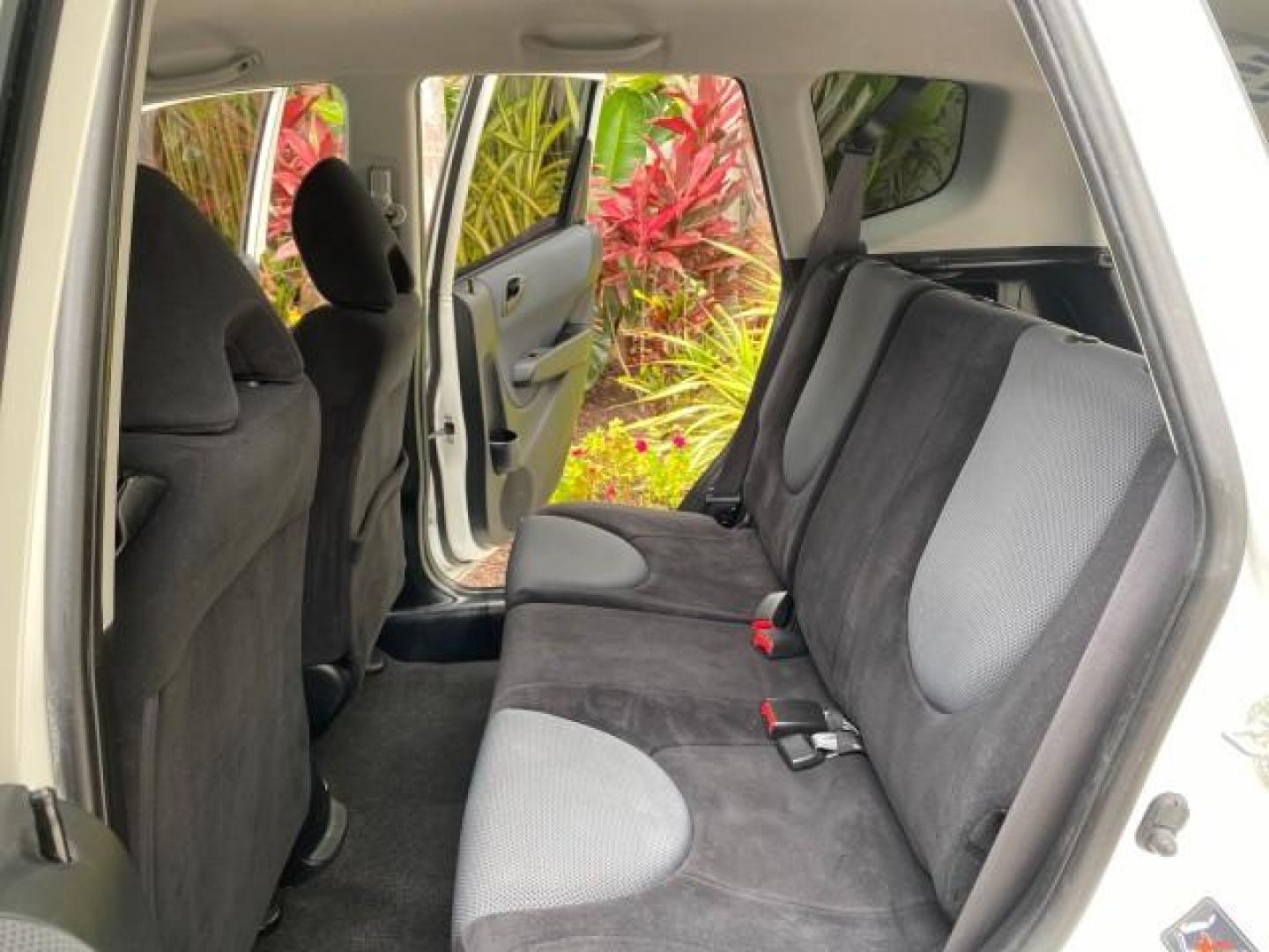 2007 Taffeta White /Black Honda Fit 37 MPG AUTO AC Sport LOW MILES 40,042 (JHMGD38687S) with an 1.5L SOHC PGM-FI 16-Valve VTEC I4 Engine engine, Automatic transmission, located at 4701 North Dixie Hwy, Pompano Beach, FL, 33064, (954) 422-2889, 26.240938, -80.123474 - OUR WEBPAGE FLORIDACARS1.COM HAS OVER 100 PHOTOS AND FREE CARFAX LINK 2007 Honda Fit Sport Hatchback 4 DR 1.5L I4 F SOHC Gasoline 37 MPG Front Wheel Drive Features ABS Brakes Air Conditioning Alloy Wheels AM/FM Stereo Automatic Transmission Auxiliary Audio Input CD Audio Cloth Seats Cruise Control O- Photo#14
