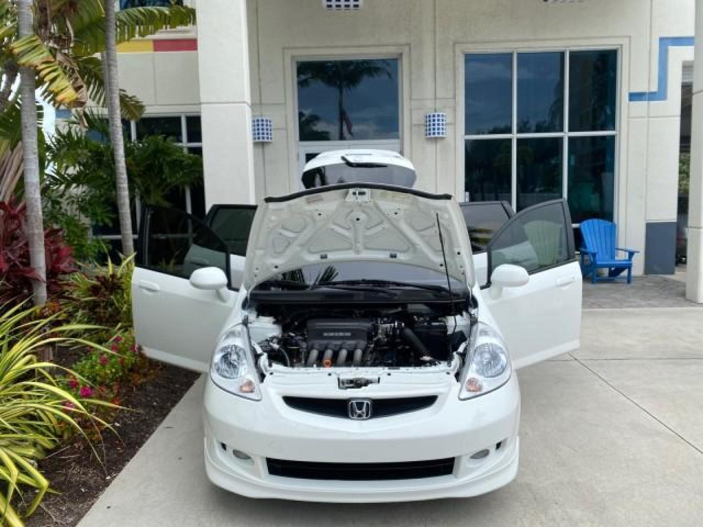 2007 Taffeta White /Black Honda Fit 37 MPG AUTO AC Sport LOW MILES 40,042 (JHMGD38687S) with an 1.5L SOHC PGM-FI 16-Valve VTEC I4 Engine engine, Automatic transmission, located at 4701 North Dixie Hwy, Pompano Beach, FL, 33064, (954) 422-2889, 26.240938, -80.123474 - OUR WEBPAGE FLORIDACARS1.COM HAS OVER 100 PHOTOS AND FREE CARFAX LINK 2007 Honda Fit Sport Hatchback 4 DR 1.5L I4 F SOHC Gasoline 37 MPG Front Wheel Drive Features ABS Brakes Air Conditioning Alloy Wheels AM/FM Stereo Automatic Transmission Auxiliary Audio Input CD Audio Cloth Seats Cruise Control O- Photo#16