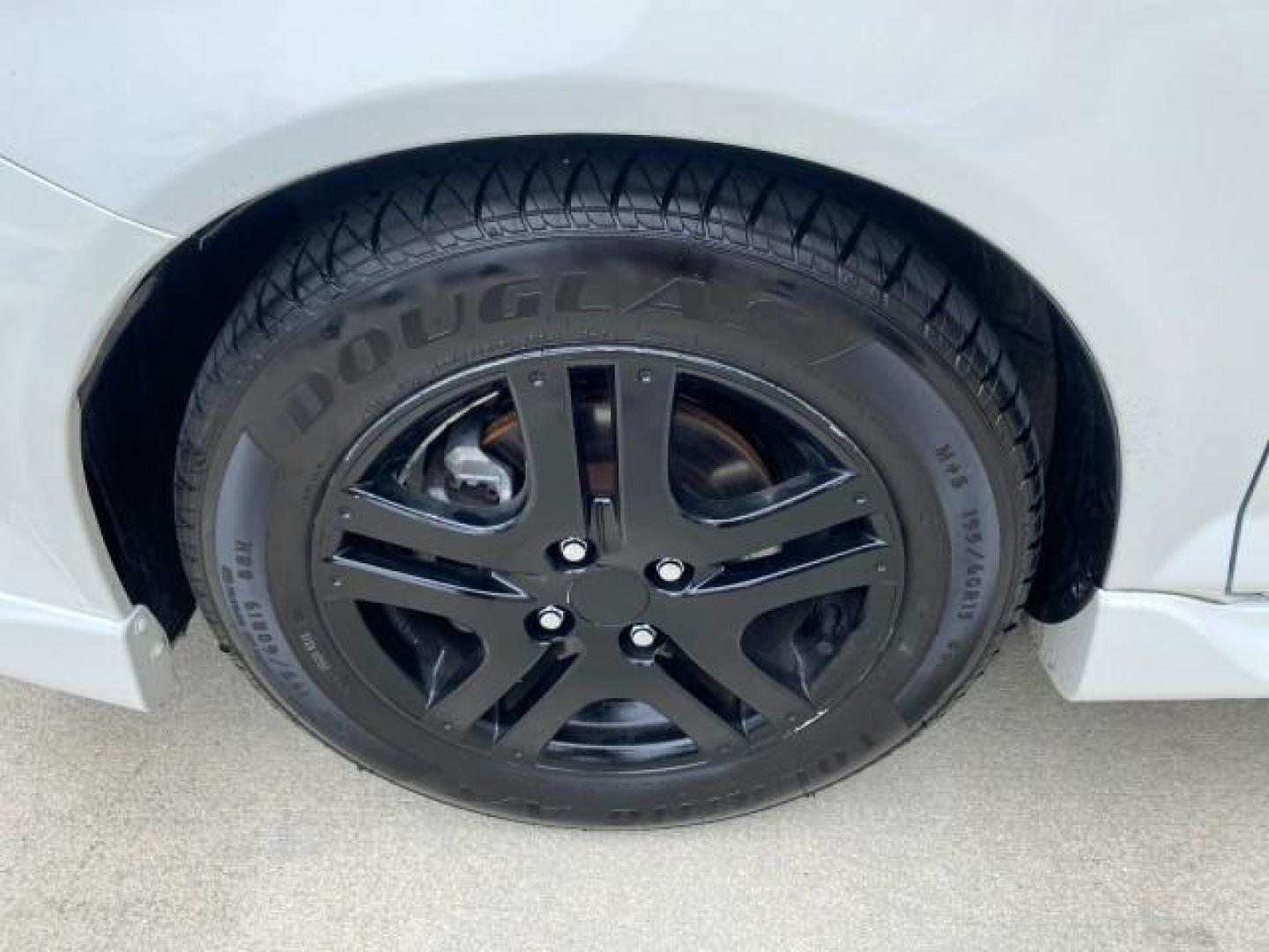 2007 Taffeta White /Black Honda Fit 37 MPG AUTO AC Sport LOW MILES 40,042 (JHMGD38687S) with an 1.5L SOHC PGM-FI 16-Valve VTEC I4 Engine engine, Automatic transmission, located at 4701 North Dixie Hwy, Pompano Beach, FL, 33064, (954) 422-2889, 26.240938, -80.123474 - OUR WEBPAGE FLORIDACARS1.COM HAS OVER 100 PHOTOS AND FREE CARFAX LINK 2007 Honda Fit Sport Hatchback 4 DR 1.5L I4 F SOHC Gasoline 37 MPG Front Wheel Drive Features ABS Brakes Air Conditioning Alloy Wheels AM/FM Stereo Automatic Transmission Auxiliary Audio Input CD Audio Cloth Seats Cruise Control O- Photo#19