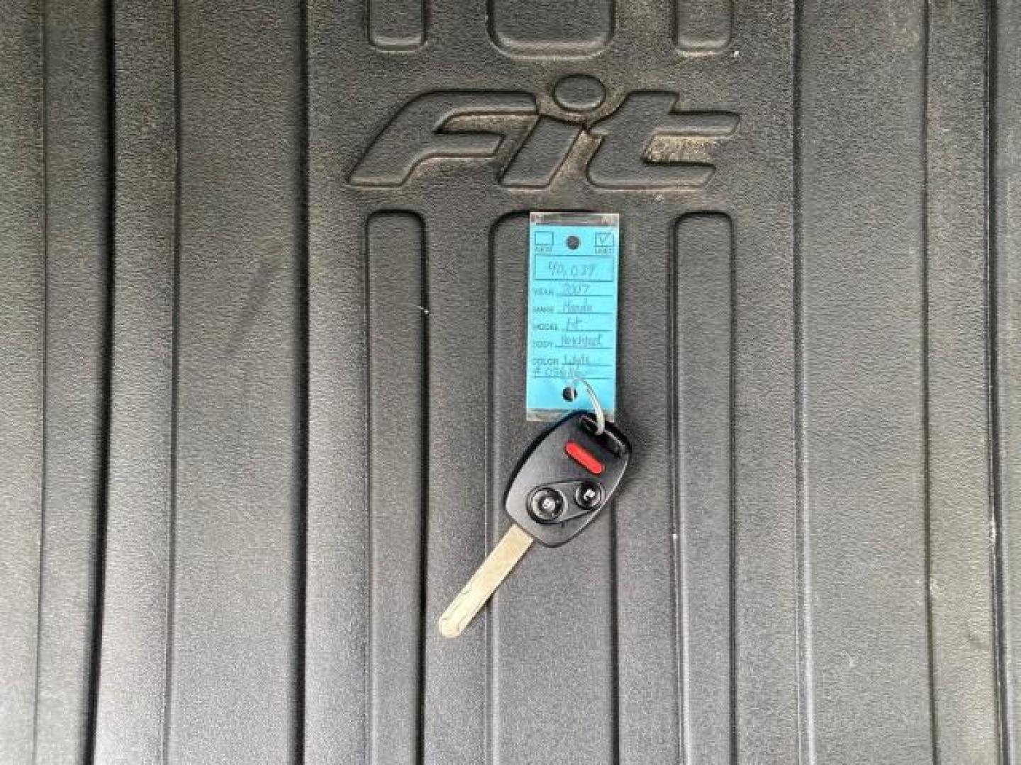 2007 Taffeta White /Black Honda Fit 37 MPG AUTO AC Sport LOW MILES 40,042 (JHMGD38687S) with an 1.5L SOHC PGM-FI 16-Valve VTEC I4 Engine engine, Automatic transmission, located at 4701 North Dixie Hwy, Pompano Beach, FL, 33064, (954) 422-2889, 26.240938, -80.123474 - OUR WEBPAGE FLORIDACARS1.COM HAS OVER 100 PHOTOS AND FREE CARFAX LINK 2007 Honda Fit Sport Hatchback 4 DR 1.5L I4 F SOHC Gasoline 37 MPG Front Wheel Drive Features ABS Brakes Air Conditioning Alloy Wheels AM/FM Stereo Automatic Transmission Auxiliary Audio Input CD Audio Cloth Seats Cruise Control O- Photo#23