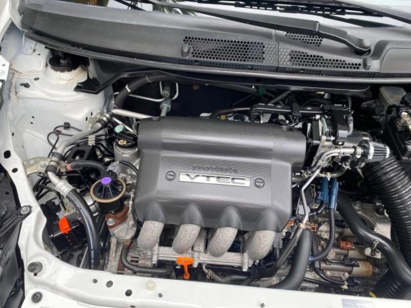 2007 Taffeta White /Black Honda Fit 37 MPG AUTO AC Sport LOW MILES 40,042 (JHMGD38687S) with an 1.5L SOHC PGM-FI 16-Valve VTEC I4 Engine engine, Automatic transmission, located at 4701 North Dixie Hwy, Pompano Beach, FL, 33064, (954) 422-2889, 26.240938, -80.123474 - OUR WEBPAGE FLORIDACARS1.COM HAS OVER 100 PHOTOS AND FREE CARFAX LINK 2007 Honda Fit Sport Hatchback 4 DR 1.5L I4 F SOHC Gasoline 37 MPG Front Wheel Drive Features ABS Brakes Air Conditioning Alloy Wheels AM/FM Stereo Automatic Transmission Auxiliary Audio Input CD Audio Cloth Seats Cruise Control O- Photo#24