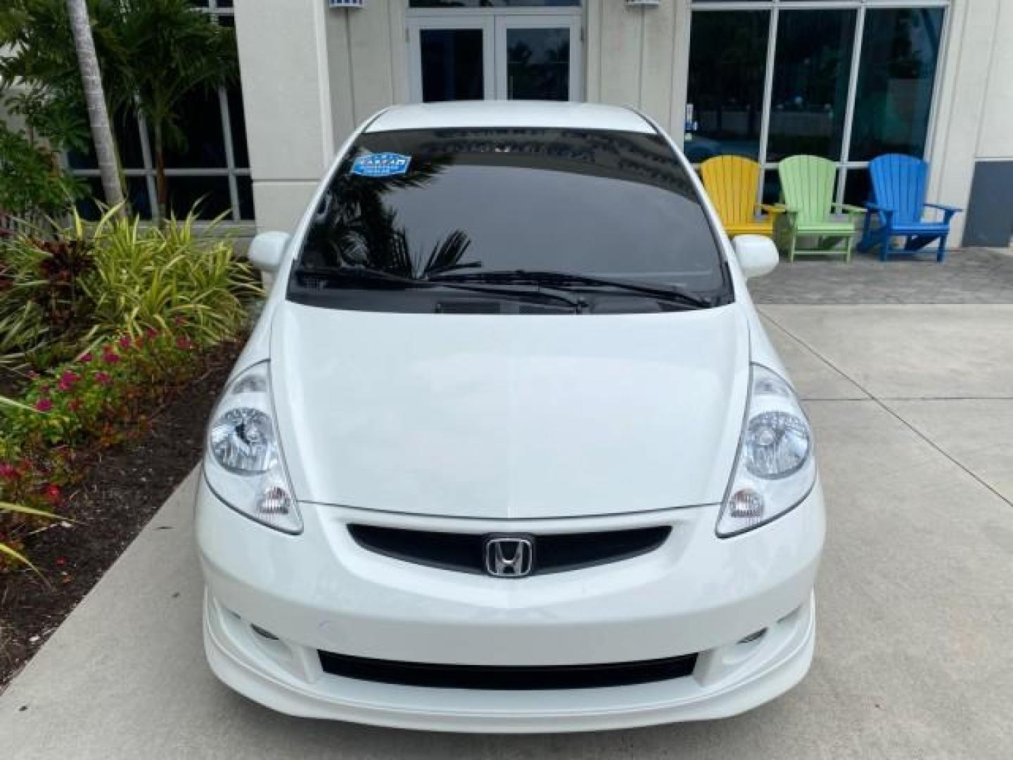 2007 Taffeta White /Black Honda Fit 37 MPG AUTO AC Sport LOW MILES 40,042 (JHMGD38687S) with an 1.5L SOHC PGM-FI 16-Valve VTEC I4 Engine engine, Automatic transmission, located at 4701 North Dixie Hwy, Pompano Beach, FL, 33064, (954) 422-2889, 26.240938, -80.123474 - OUR WEBPAGE FLORIDACARS1.COM HAS OVER 100 PHOTOS AND FREE CARFAX LINK 2007 Honda Fit Sport Hatchback 4 DR 1.5L I4 F SOHC Gasoline 37 MPG Front Wheel Drive Features ABS Brakes Air Conditioning Alloy Wheels AM/FM Stereo Automatic Transmission Auxiliary Audio Input CD Audio Cloth Seats Cruise Control O- Photo#27