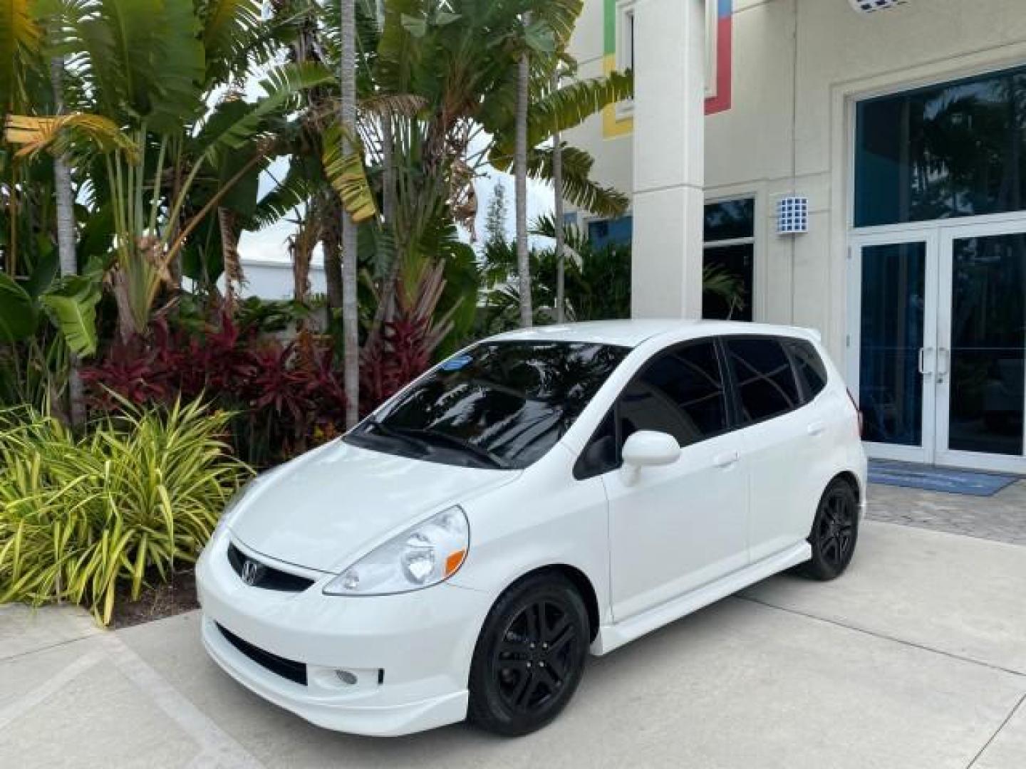 2007 Taffeta White /Black Honda Fit 37 MPG AUTO AC Sport LOW MILES 40,042 (JHMGD38687S) with an 1.5L SOHC PGM-FI 16-Valve VTEC I4 Engine engine, Automatic transmission, located at 4701 North Dixie Hwy, Pompano Beach, FL, 33064, (954) 422-2889, 26.240938, -80.123474 - OUR WEBPAGE FLORIDACARS1.COM HAS OVER 100 PHOTOS AND FREE CARFAX LINK 2007 Honda Fit Sport Hatchback 4 DR 1.5L I4 F SOHC Gasoline 37 MPG Front Wheel Drive Features ABS Brakes Air Conditioning Alloy Wheels AM/FM Stereo Automatic Transmission Auxiliary Audio Input CD Audio Cloth Seats Cruise Control O- Photo#28