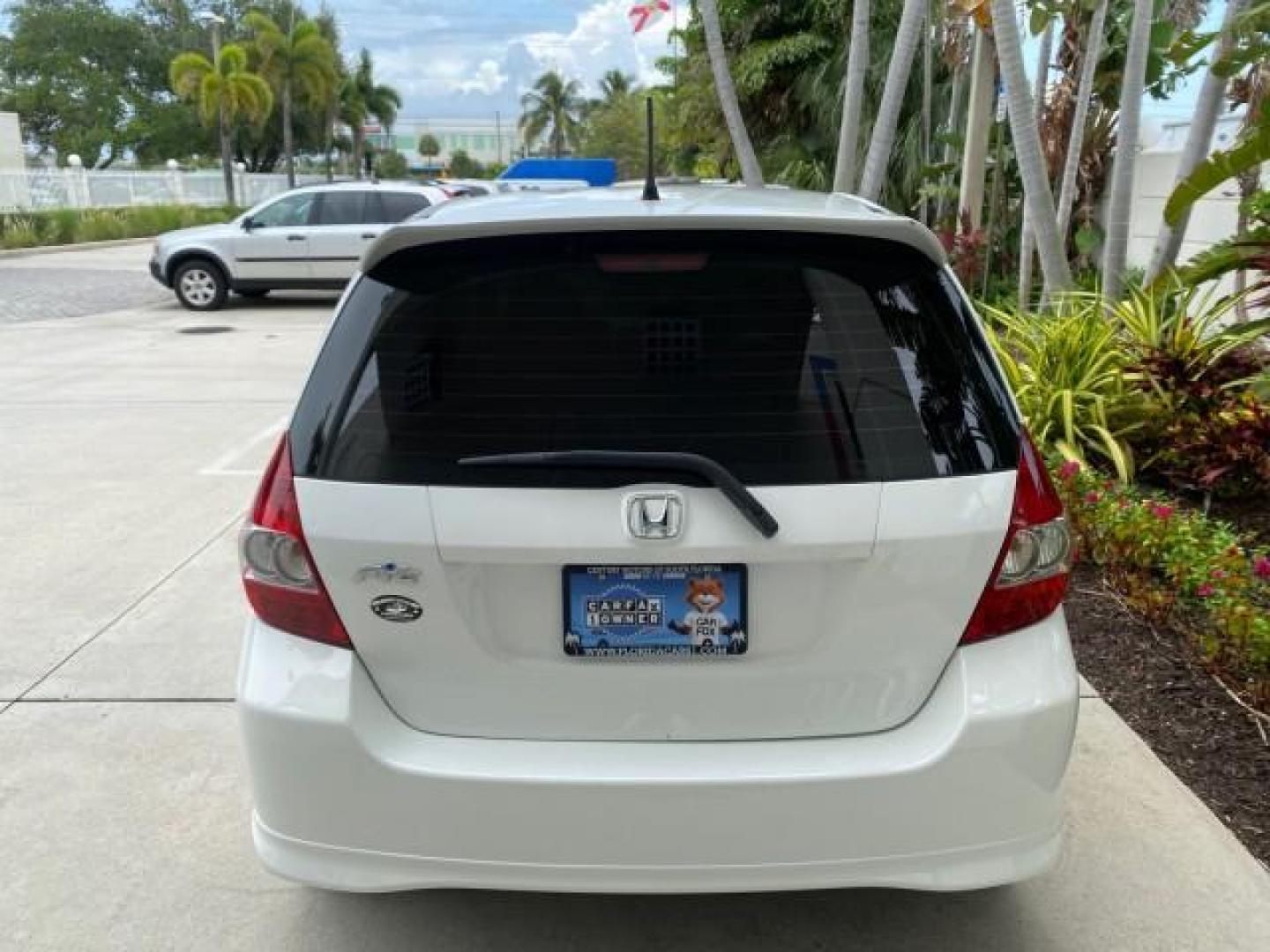 2007 Taffeta White /Black Honda Fit 37 MPG AUTO AC Sport LOW MILES 40,042 (JHMGD38687S) with an 1.5L SOHC PGM-FI 16-Valve VTEC I4 Engine engine, Automatic transmission, located at 4701 North Dixie Hwy, Pompano Beach, FL, 33064, (954) 422-2889, 26.240938, -80.123474 - OUR WEBPAGE FLORIDACARS1.COM HAS OVER 100 PHOTOS AND FREE CARFAX LINK 2007 Honda Fit Sport Hatchback 4 DR 1.5L I4 F SOHC Gasoline 37 MPG Front Wheel Drive Features ABS Brakes Air Conditioning Alloy Wheels AM/FM Stereo Automatic Transmission Auxiliary Audio Input CD Audio Cloth Seats Cruise Control O- Photo#35