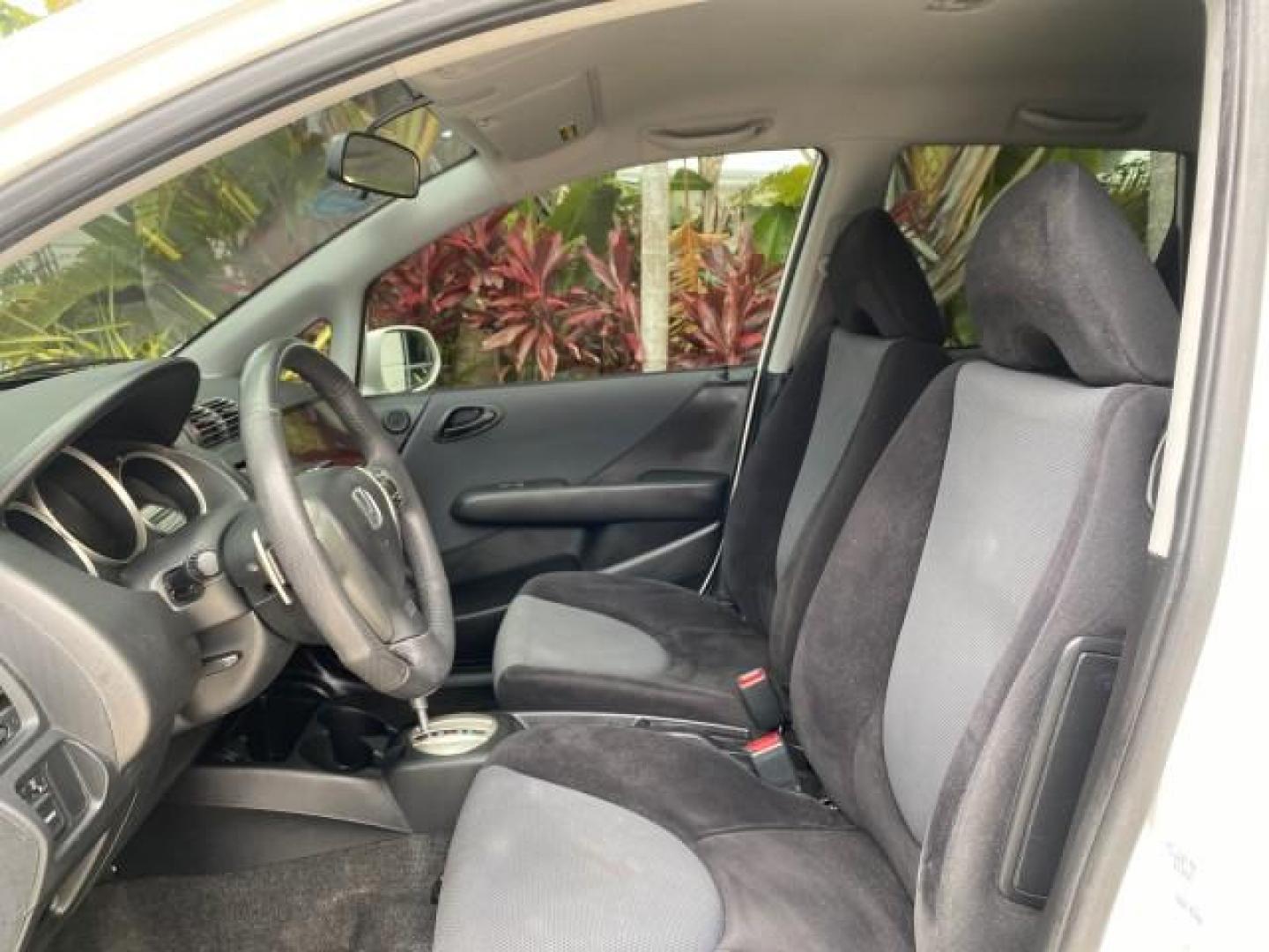 2007 Taffeta White /Black Honda Fit 37 MPG AUTO AC Sport LOW MILES 40,042 (JHMGD38687S) with an 1.5L SOHC PGM-FI 16-Valve VTEC I4 Engine engine, Automatic transmission, located at 4701 North Dixie Hwy, Pompano Beach, FL, 33064, (954) 422-2889, 26.240938, -80.123474 - OUR WEBPAGE FLORIDACARS1.COM HAS OVER 100 PHOTOS AND FREE CARFAX LINK 2007 Honda Fit Sport Hatchback 4 DR 1.5L I4 F SOHC Gasoline 37 MPG Front Wheel Drive Features ABS Brakes Air Conditioning Alloy Wheels AM/FM Stereo Automatic Transmission Auxiliary Audio Input CD Audio Cloth Seats Cruise Control O- Photo#43