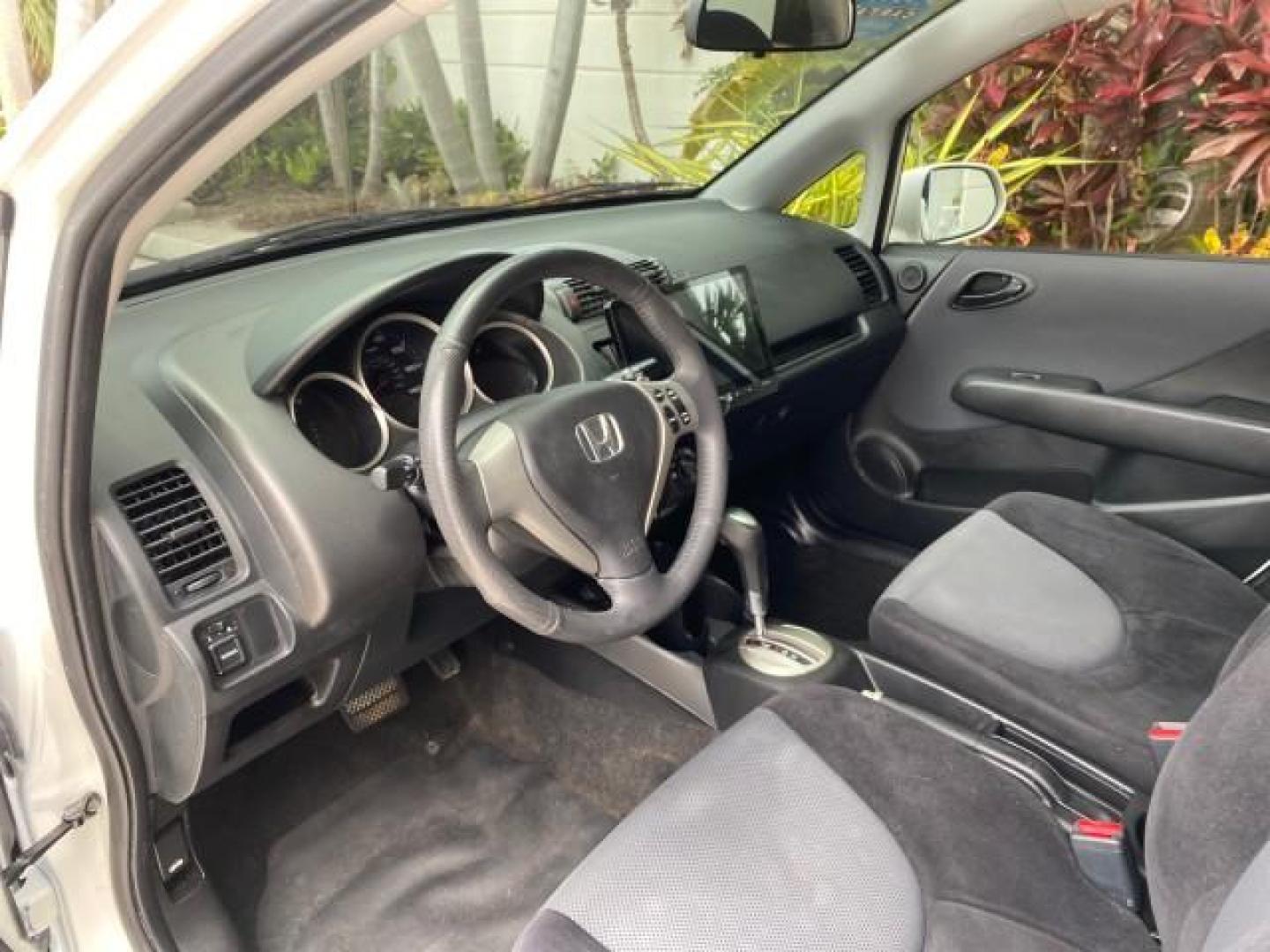2007 Taffeta White /Black Honda Fit 37 MPG AUTO AC Sport LOW MILES 40,042 (JHMGD38687S) with an 1.5L SOHC PGM-FI 16-Valve VTEC I4 Engine engine, Automatic transmission, located at 4701 North Dixie Hwy, Pompano Beach, FL, 33064, (954) 422-2889, 26.240938, -80.123474 - OUR WEBPAGE FLORIDACARS1.COM HAS OVER 100 PHOTOS AND FREE CARFAX LINK 2007 Honda Fit Sport Hatchback 4 DR 1.5L I4 F SOHC Gasoline 37 MPG Front Wheel Drive Features ABS Brakes Air Conditioning Alloy Wheels AM/FM Stereo Automatic Transmission Auxiliary Audio Input CD Audio Cloth Seats Cruise Control O- Photo#45