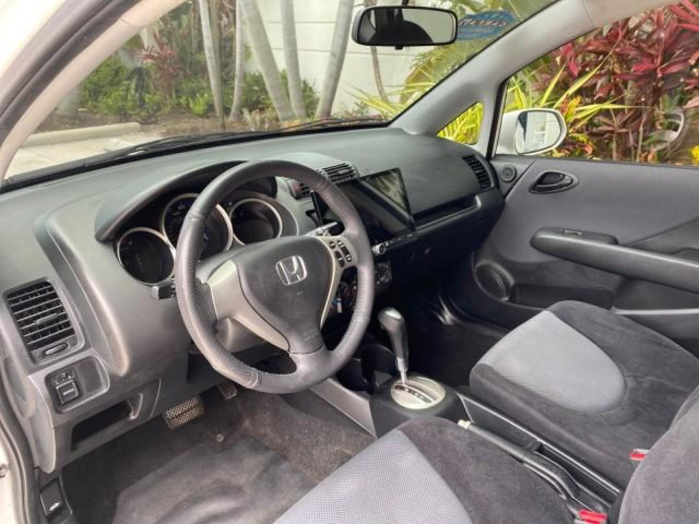 2007 Taffeta White /Black Honda Fit 37 MPG AUTO AC Sport LOW MILES 40,042 (JHMGD38687S) with an 1.5L SOHC PGM-FI 16-Valve VTEC I4 Engine engine, Automatic transmission, located at 4701 North Dixie Hwy, Pompano Beach, FL, 33064, (954) 422-2889, 26.240938, -80.123474 - OUR WEBPAGE FLORIDACARS1.COM HAS OVER 100 PHOTOS AND FREE CARFAX LINK 2007 Honda Fit Sport Hatchback 4 DR 1.5L I4 F SOHC Gasoline 37 MPG Front Wheel Drive Features ABS Brakes Air Conditioning Alloy Wheels AM/FM Stereo Automatic Transmission Auxiliary Audio Input CD Audio Cloth Seats Cruise Control O- Photo#46