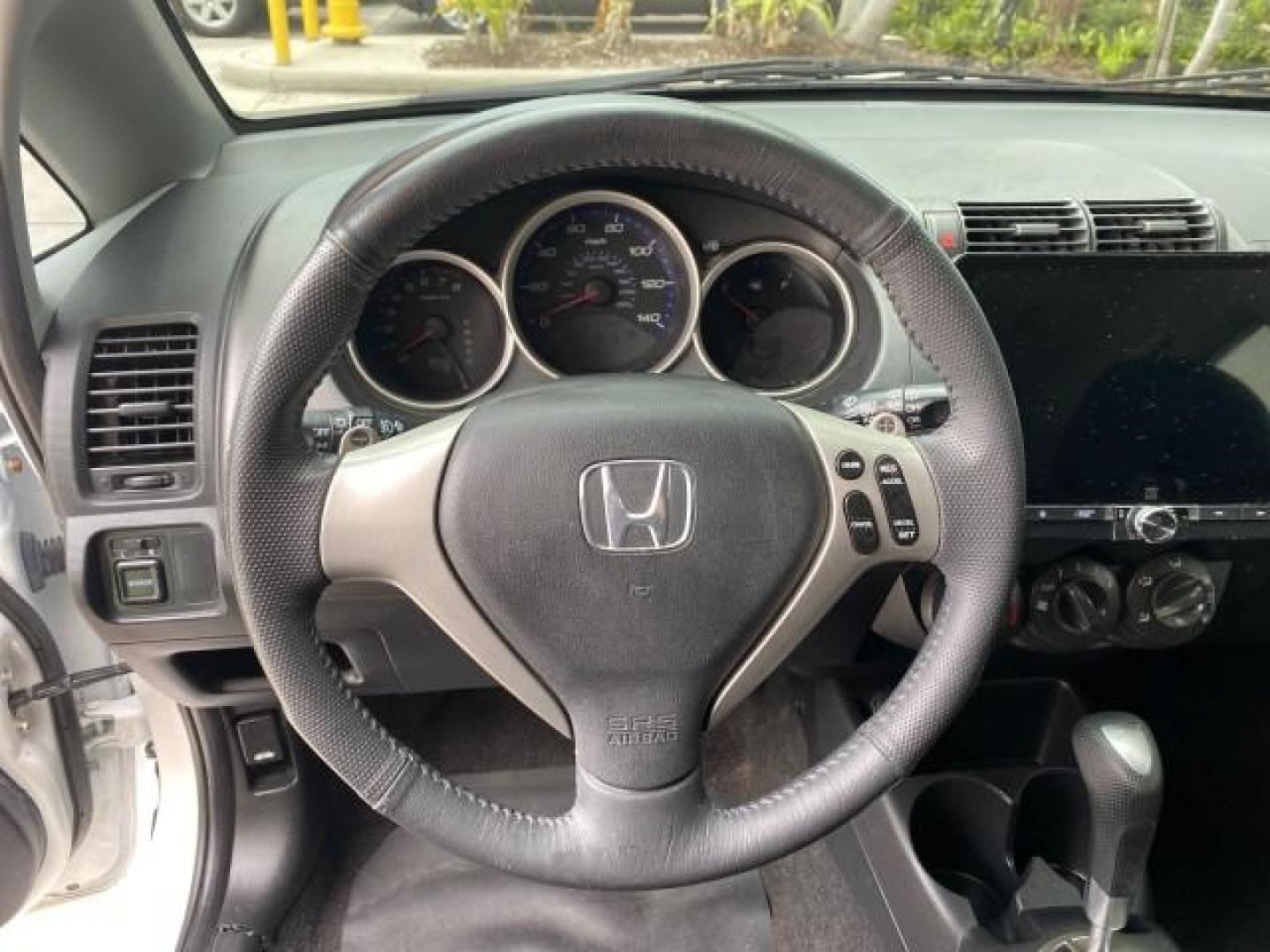 2007 Taffeta White /Black Honda Fit 37 MPG AUTO AC Sport LOW MILES 40,042 (JHMGD38687S) with an 1.5L SOHC PGM-FI 16-Valve VTEC I4 Engine engine, Automatic transmission, located at 4701 North Dixie Hwy, Pompano Beach, FL, 33064, (954) 422-2889, 26.240938, -80.123474 - OUR WEBPAGE FLORIDACARS1.COM HAS OVER 100 PHOTOS AND FREE CARFAX LINK 2007 Honda Fit Sport Hatchback 4 DR 1.5L I4 F SOHC Gasoline 37 MPG Front Wheel Drive Features ABS Brakes Air Conditioning Alloy Wheels AM/FM Stereo Automatic Transmission Auxiliary Audio Input CD Audio Cloth Seats Cruise Control O- Photo#47