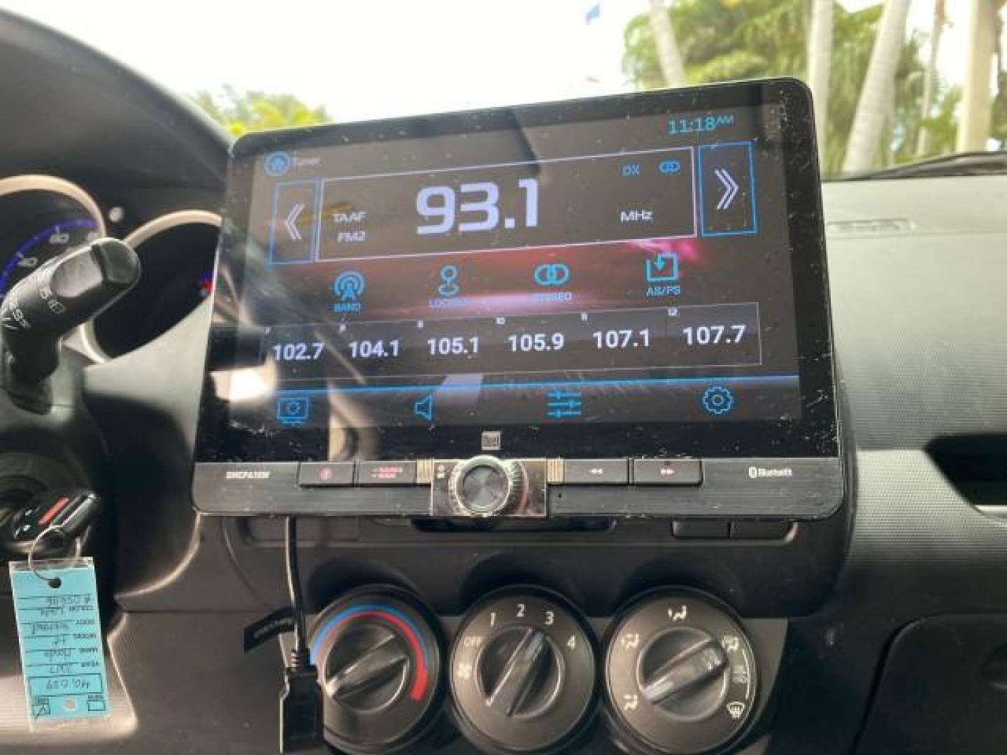 2007 Taffeta White /Black Honda Fit 37 MPG AUTO AC Sport LOW MILES 40,042 (JHMGD38687S) with an 1.5L SOHC PGM-FI 16-Valve VTEC I4 Engine engine, Automatic transmission, located at 4701 North Dixie Hwy, Pompano Beach, FL, 33064, (954) 422-2889, 26.240938, -80.123474 - OUR WEBPAGE FLORIDACARS1.COM HAS OVER 100 PHOTOS AND FREE CARFAX LINK 2007 Honda Fit Sport Hatchback 4 DR 1.5L I4 F SOHC Gasoline 37 MPG Front Wheel Drive Features ABS Brakes Air Conditioning Alloy Wheels AM/FM Stereo Automatic Transmission Auxiliary Audio Input CD Audio Cloth Seats Cruise Control O- Photo#55