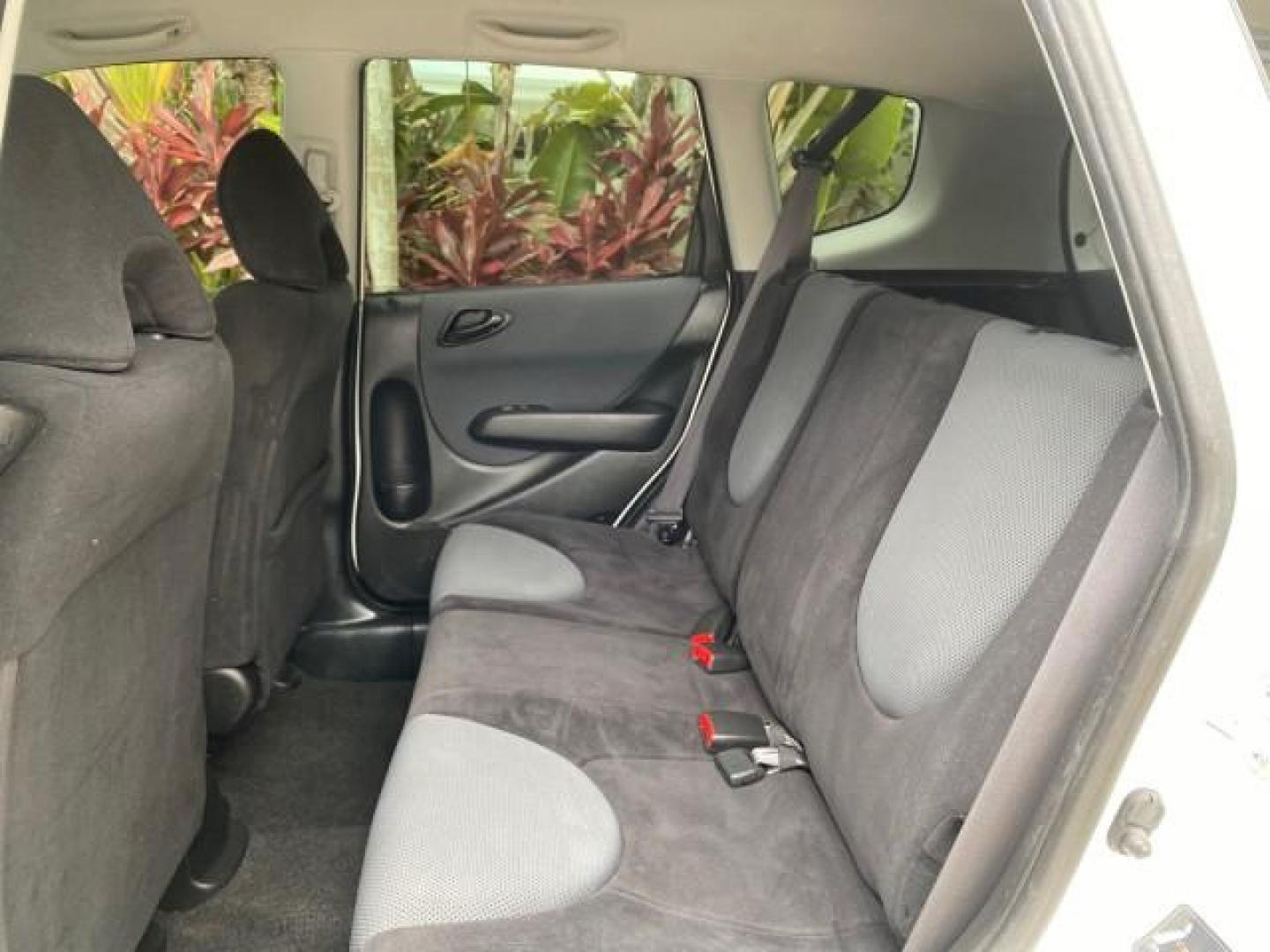 2007 Taffeta White /Black Honda Fit 37 MPG AUTO AC Sport LOW MILES 40,042 (JHMGD38687S) with an 1.5L SOHC PGM-FI 16-Valve VTEC I4 Engine engine, Automatic transmission, located at 4701 North Dixie Hwy, Pompano Beach, FL, 33064, (954) 422-2889, 26.240938, -80.123474 - OUR WEBPAGE FLORIDACARS1.COM HAS OVER 100 PHOTOS AND FREE CARFAX LINK 2007 Honda Fit Sport Hatchback 4 DR 1.5L I4 F SOHC Gasoline 37 MPG Front Wheel Drive Features ABS Brakes Air Conditioning Alloy Wheels AM/FM Stereo Automatic Transmission Auxiliary Audio Input CD Audio Cloth Seats Cruise Control O- Photo#70