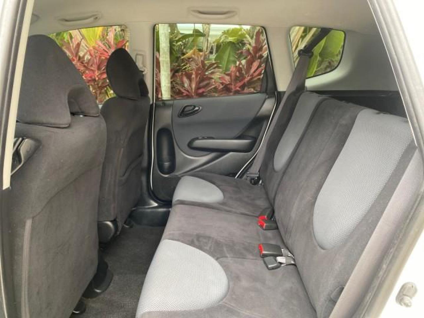 2007 Taffeta White /Black Honda Fit 37 MPG AUTO AC Sport LOW MILES 40,042 (JHMGD38687S) with an 1.5L SOHC PGM-FI 16-Valve VTEC I4 Engine engine, Automatic transmission, located at 4701 North Dixie Hwy, Pompano Beach, FL, 33064, (954) 422-2889, 26.240938, -80.123474 - OUR WEBPAGE FLORIDACARS1.COM HAS OVER 100 PHOTOS AND FREE CARFAX LINK 2007 Honda Fit Sport Hatchback 4 DR 1.5L I4 F SOHC Gasoline 37 MPG Front Wheel Drive Features ABS Brakes Air Conditioning Alloy Wheels AM/FM Stereo Automatic Transmission Auxiliary Audio Input CD Audio Cloth Seats Cruise Control O- Photo#71