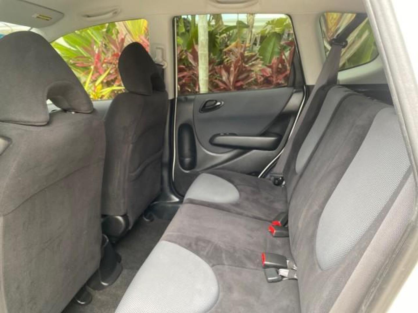 2007 Taffeta White /Black Honda Fit 37 MPG AUTO AC Sport LOW MILES 40,042 (JHMGD38687S) with an 1.5L SOHC PGM-FI 16-Valve VTEC I4 Engine engine, Automatic transmission, located at 4701 North Dixie Hwy, Pompano Beach, FL, 33064, (954) 422-2889, 26.240938, -80.123474 - OUR WEBPAGE FLORIDACARS1.COM HAS OVER 100 PHOTOS AND FREE CARFAX LINK 2007 Honda Fit Sport Hatchback 4 DR 1.5L I4 F SOHC Gasoline 37 MPG Front Wheel Drive Features ABS Brakes Air Conditioning Alloy Wheels AM/FM Stereo Automatic Transmission Auxiliary Audio Input CD Audio Cloth Seats Cruise Control O- Photo#72