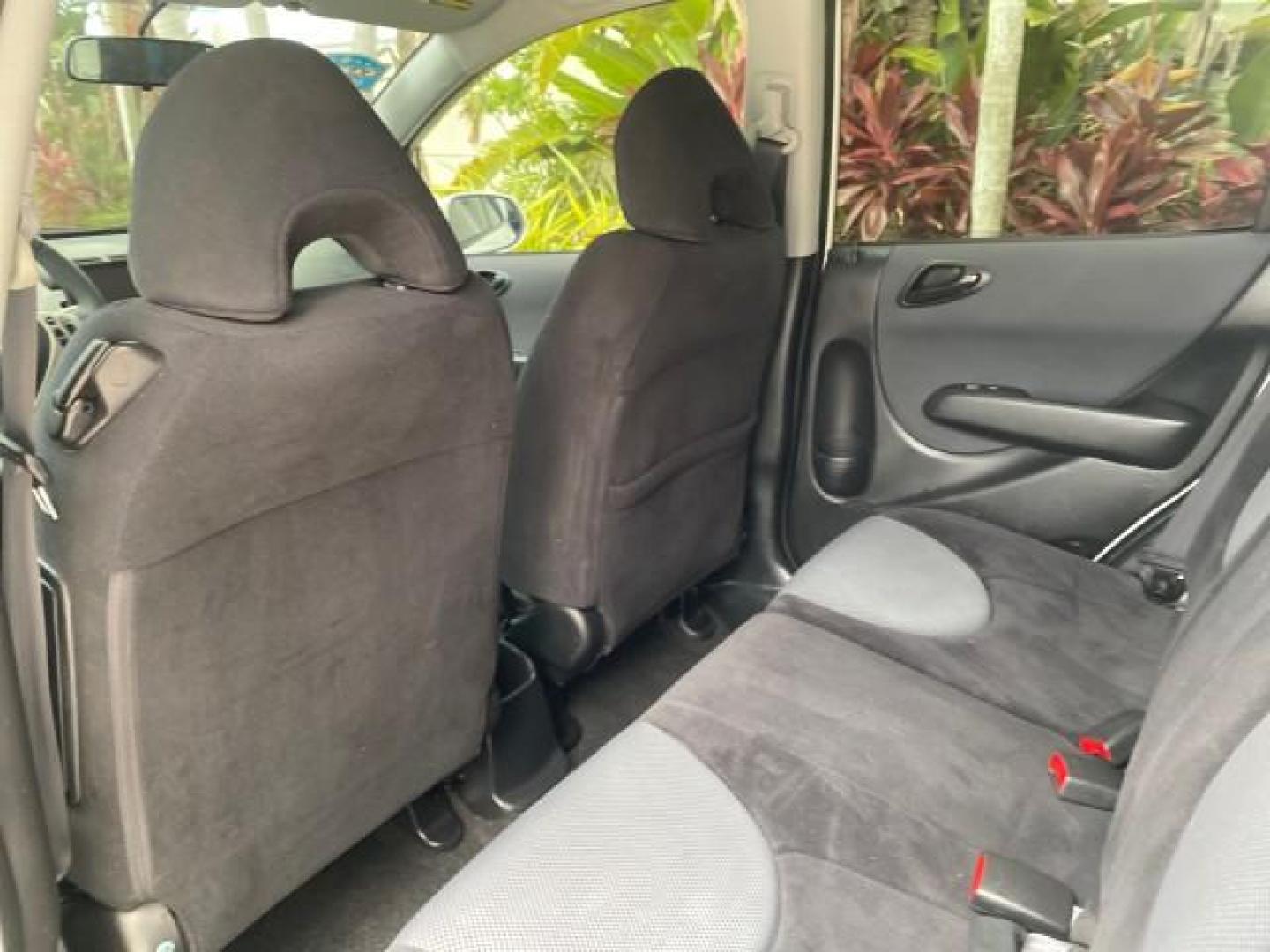 2007 Taffeta White /Black Honda Fit 37 MPG AUTO AC Sport LOW MILES 40,042 (JHMGD38687S) with an 1.5L SOHC PGM-FI 16-Valve VTEC I4 Engine engine, Automatic transmission, located at 4701 North Dixie Hwy, Pompano Beach, FL, 33064, (954) 422-2889, 26.240938, -80.123474 - OUR WEBPAGE FLORIDACARS1.COM HAS OVER 100 PHOTOS AND FREE CARFAX LINK 2007 Honda Fit Sport Hatchback 4 DR 1.5L I4 F SOHC Gasoline 37 MPG Front Wheel Drive Features ABS Brakes Air Conditioning Alloy Wheels AM/FM Stereo Automatic Transmission Auxiliary Audio Input CD Audio Cloth Seats Cruise Control O- Photo#73