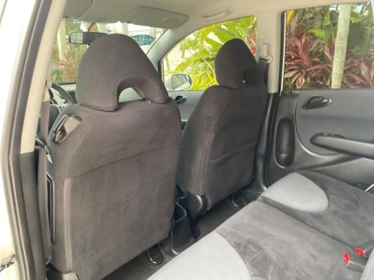 2007 Taffeta White /Black Honda Fit 37 MPG AUTO AC Sport LOW MILES 40,042 (JHMGD38687S) with an 1.5L SOHC PGM-FI 16-Valve VTEC I4 Engine engine, Automatic transmission, located at 4701 North Dixie Hwy, Pompano Beach, FL, 33064, (954) 422-2889, 26.240938, -80.123474 - OUR WEBPAGE FLORIDACARS1.COM HAS OVER 100 PHOTOS AND FREE CARFAX LINK 2007 Honda Fit Sport Hatchback 4 DR 1.5L I4 F SOHC Gasoline 37 MPG Front Wheel Drive Features ABS Brakes Air Conditioning Alloy Wheels AM/FM Stereo Automatic Transmission Auxiliary Audio Input CD Audio Cloth Seats Cruise Control O- Photo#74
