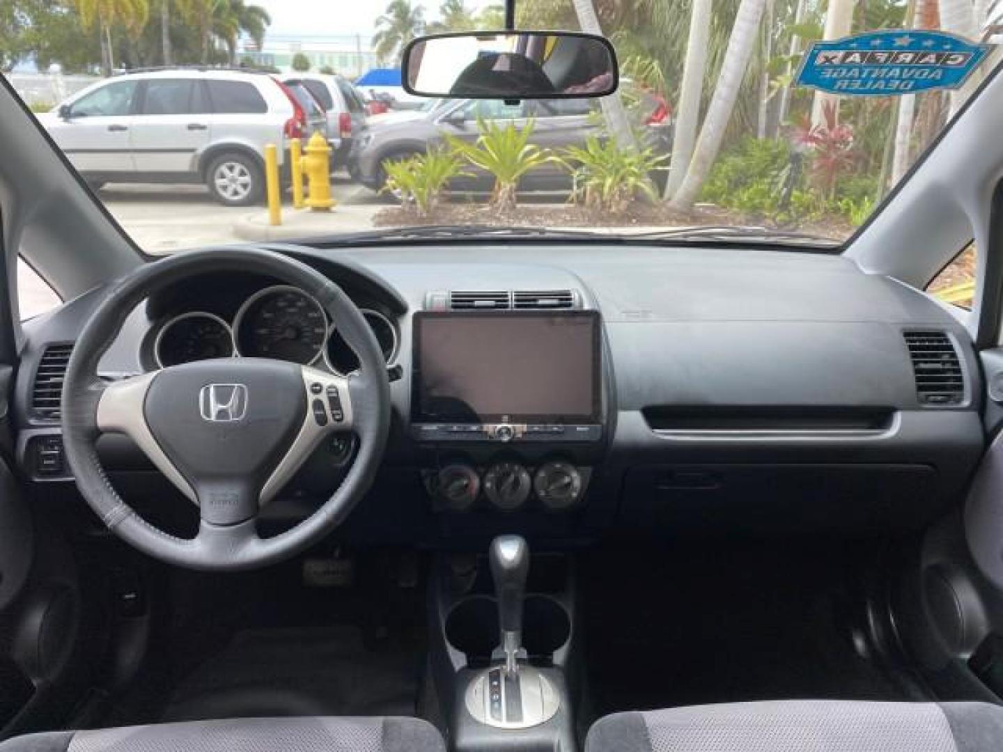 2007 Taffeta White /Black Honda Fit 37 MPG AUTO AC Sport LOW MILES 40,042 (JHMGD38687S) with an 1.5L SOHC PGM-FI 16-Valve VTEC I4 Engine engine, Automatic transmission, located at 4701 North Dixie Hwy, Pompano Beach, FL, 33064, (954) 422-2889, 26.240938, -80.123474 - OUR WEBPAGE FLORIDACARS1.COM HAS OVER 100 PHOTOS AND FREE CARFAX LINK 2007 Honda Fit Sport Hatchback 4 DR 1.5L I4 F SOHC Gasoline 37 MPG Front Wheel Drive Features ABS Brakes Air Conditioning Alloy Wheels AM/FM Stereo Automatic Transmission Auxiliary Audio Input CD Audio Cloth Seats Cruise Control O- Photo#76