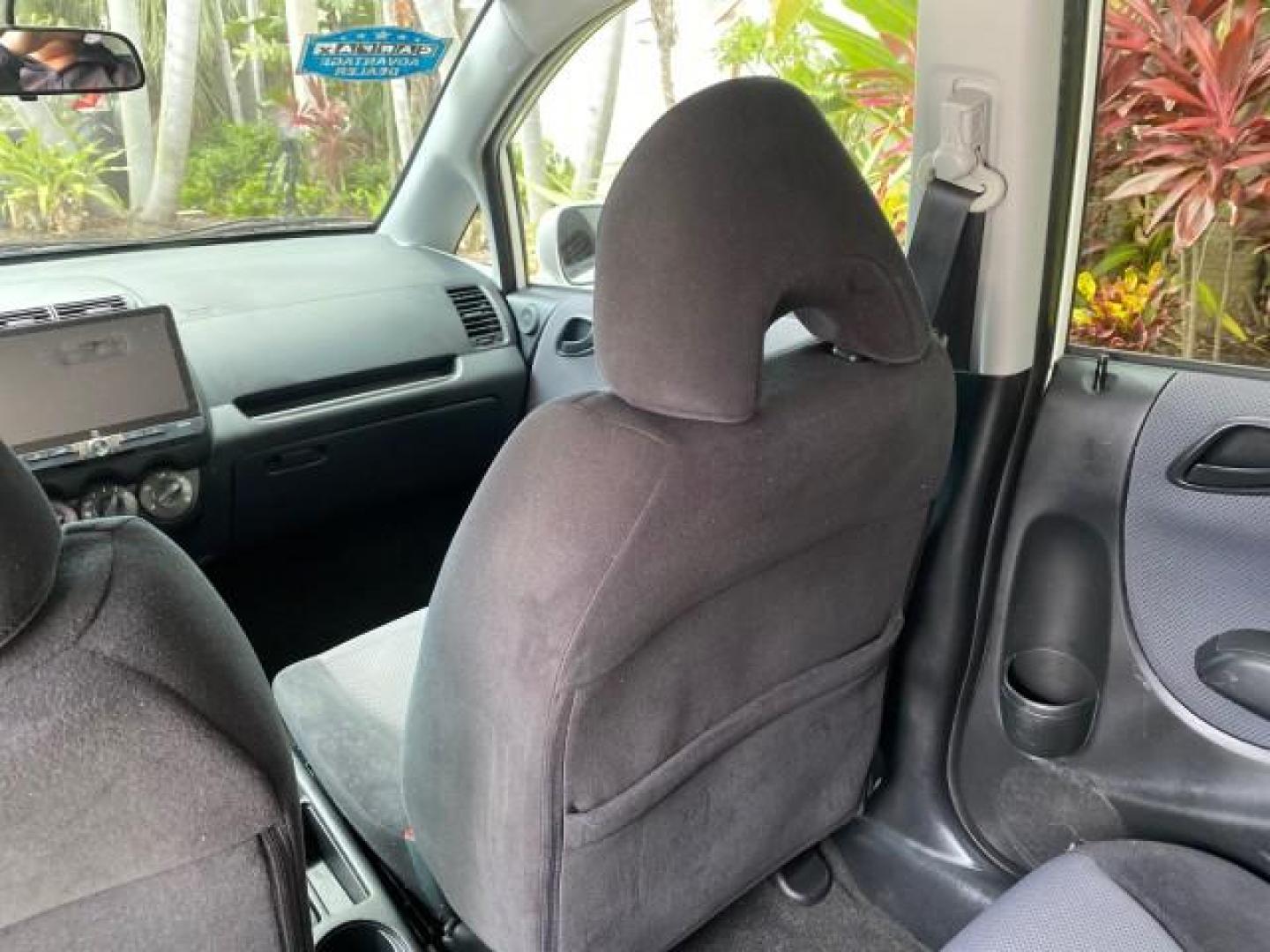 2007 Taffeta White /Black Honda Fit 37 MPG AUTO AC Sport LOW MILES 40,042 (JHMGD38687S) with an 1.5L SOHC PGM-FI 16-Valve VTEC I4 Engine engine, Automatic transmission, located at 4701 North Dixie Hwy, Pompano Beach, FL, 33064, (954) 422-2889, 26.240938, -80.123474 - OUR WEBPAGE FLORIDACARS1.COM HAS OVER 100 PHOTOS AND FREE CARFAX LINK 2007 Honda Fit Sport Hatchback 4 DR 1.5L I4 F SOHC Gasoline 37 MPG Front Wheel Drive Features ABS Brakes Air Conditioning Alloy Wheels AM/FM Stereo Automatic Transmission Auxiliary Audio Input CD Audio Cloth Seats Cruise Control O- Photo#77