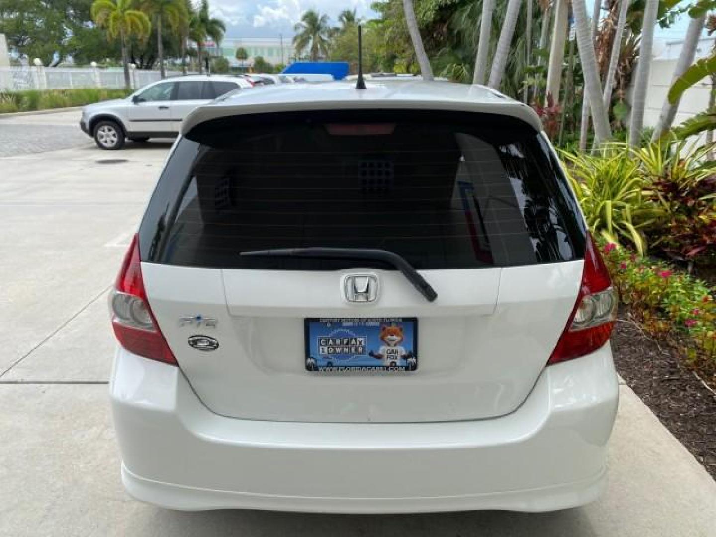 2007 Taffeta White /Black Honda Fit 37 MPG AUTO AC Sport LOW MILES 40,042 (JHMGD38687S) with an 1.5L SOHC PGM-FI 16-Valve VTEC I4 Engine engine, Automatic transmission, located at 4701 North Dixie Hwy, Pompano Beach, FL, 33064, (954) 422-2889, 26.240938, -80.123474 - OUR WEBPAGE FLORIDACARS1.COM HAS OVER 100 PHOTOS AND FREE CARFAX LINK 2007 Honda Fit Sport Hatchback 4 DR 1.5L I4 F SOHC Gasoline 37 MPG Front Wheel Drive Features ABS Brakes Air Conditioning Alloy Wheels AM/FM Stereo Automatic Transmission Auxiliary Audio Input CD Audio Cloth Seats Cruise Control O- Photo#84