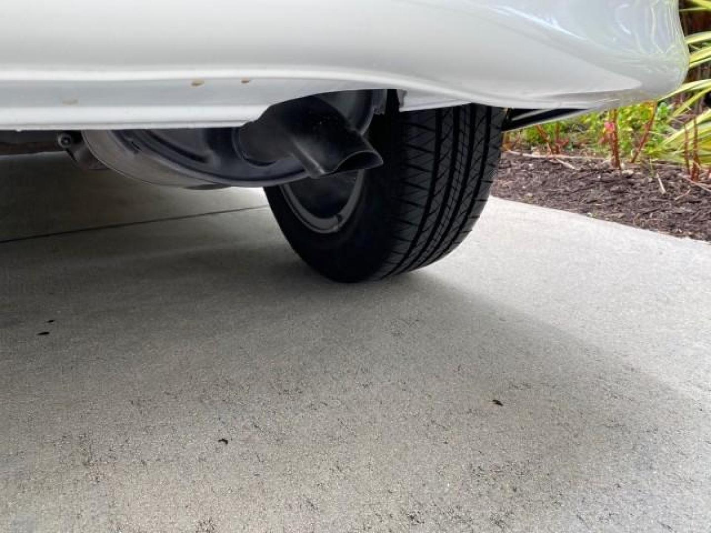 2007 Taffeta White /Black Honda Fit 37 MPG AUTO AC Sport LOW MILES 40,042 (JHMGD38687S) with an 1.5L SOHC PGM-FI 16-Valve VTEC I4 Engine engine, Automatic transmission, located at 4701 North Dixie Hwy, Pompano Beach, FL, 33064, (954) 422-2889, 26.240938, -80.123474 - OUR WEBPAGE FLORIDACARS1.COM HAS OVER 100 PHOTOS AND FREE CARFAX LINK 2007 Honda Fit Sport Hatchback 4 DR 1.5L I4 F SOHC Gasoline 37 MPG Front Wheel Drive Features ABS Brakes Air Conditioning Alloy Wheels AM/FM Stereo Automatic Transmission Auxiliary Audio Input CD Audio Cloth Seats Cruise Control O- Photo#87