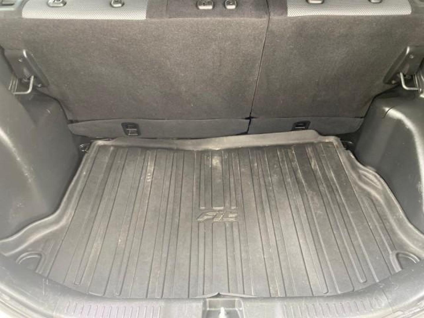 2007 Taffeta White /Black Honda Fit 37 MPG AUTO AC Sport LOW MILES 40,042 (JHMGD38687S) with an 1.5L SOHC PGM-FI 16-Valve VTEC I4 Engine engine, Automatic transmission, located at 4701 North Dixie Hwy, Pompano Beach, FL, 33064, (954) 422-2889, 26.240938, -80.123474 - OUR WEBPAGE FLORIDACARS1.COM HAS OVER 100 PHOTOS AND FREE CARFAX LINK 2007 Honda Fit Sport Hatchback 4 DR 1.5L I4 F SOHC Gasoline 37 MPG Front Wheel Drive Features ABS Brakes Air Conditioning Alloy Wheels AM/FM Stereo Automatic Transmission Auxiliary Audio Input CD Audio Cloth Seats Cruise Control O- Photo#91