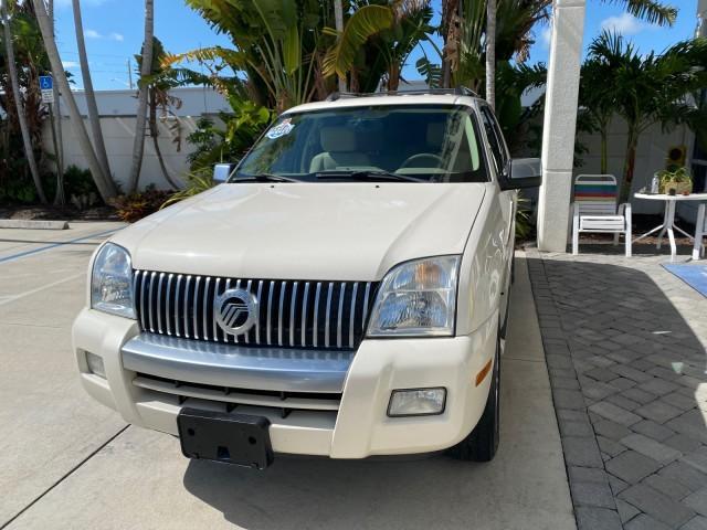 2007 Oxford White /Camel Mercury Mountaineer SUV Premier 1 OWNER (4M2EU38867U) with an 4.6L SOHC 24-Valve V8 Engine engine, Automatic transmission, located at 4701 North Dixie Hwy, Pompano Beach, FL, 33064, (954) 422-2889, 26.240938, -80.123474 - OUR WEBPAGE FLORIDACARS1.COM HAS OVER 100 PHOTOS AND FREE CARFAX LINK 2007 Mercury Mountaineer Premier 4 Door Wagon/Sport Utility 4.6L V8 F SOHC Gasoline 21 MPG Rear Wheel Drive Features ABS Brakes Air Conditioning Alloy Wheels AM/FM Stereo Audiophile Sound System Automatic Transmission Auxiliary Au- Photo#3