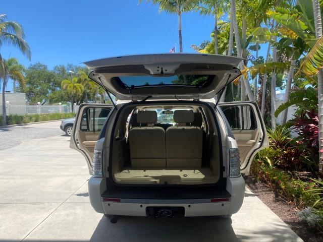 2007 Oxford White /Camel Mercury Mountaineer SUV Premier 1 OWNER (4M2EU38867U) with an 4.6L SOHC 24-Valve V8 Engine engine, Automatic transmission, located at 4701 North Dixie Hwy, Pompano Beach, FL, 33064, (954) 422-2889, 26.240938, -80.123474 - OUR WEBPAGE FLORIDACARS1.COM HAS OVER 100 PHOTOS AND FREE CARFAX LINK 2007 Mercury Mountaineer Premier 4 Door Wagon/Sport Utility 4.6L V8 F SOHC Gasoline 21 MPG Rear Wheel Drive Features ABS Brakes Air Conditioning Alloy Wheels AM/FM Stereo Audiophile Sound System Automatic Transmission Auxiliary Au- Photo#15