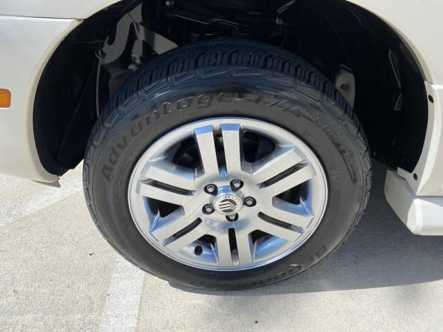 2007 Oxford White /Camel Mercury Mountaineer SUV Premier 1 OWNER (4M2EU38867U) with an 4.6L SOHC 24-Valve V8 Engine engine, Automatic transmission, located at 4701 North Dixie Hwy, Pompano Beach, FL, 33064, (954) 422-2889, 26.240938, -80.123474 - OUR WEBPAGE FLORIDACARS1.COM HAS OVER 100 PHOTOS AND FREE CARFAX LINK 2007 Mercury Mountaineer Premier 4 Door Wagon/Sport Utility 4.6L V8 F SOHC Gasoline 21 MPG Rear Wheel Drive Features ABS Brakes Air Conditioning Alloy Wheels AM/FM Stereo Audiophile Sound System Automatic Transmission Auxiliary Au- Photo#19