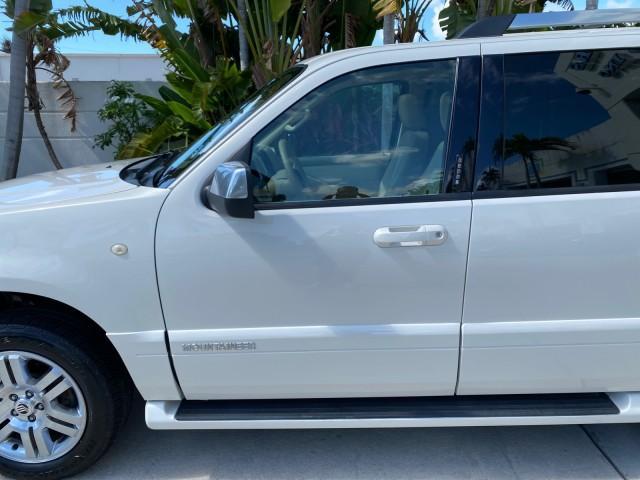 2007 Oxford White /Camel Mercury Mountaineer SUV Premier 1 OWNER (4M2EU38867U) with an 4.6L SOHC 24-Valve V8 Engine engine, Automatic transmission, located at 4701 North Dixie Hwy, Pompano Beach, FL, 33064, (954) 422-2889, 26.240938, -80.123474 - OUR WEBPAGE FLORIDACARS1.COM HAS OVER 100 PHOTOS AND FREE CARFAX LINK 2007 Mercury Mountaineer Premier 4 Door Wagon/Sport Utility 4.6L V8 F SOHC Gasoline 21 MPG Rear Wheel Drive Features ABS Brakes Air Conditioning Alloy Wheels AM/FM Stereo Audiophile Sound System Automatic Transmission Auxiliary Au- Photo#37