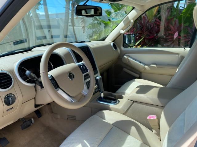2007 Oxford White /Camel Mercury Mountaineer SUV Premier 1 OWNER (4M2EU38867U) with an 4.6L SOHC 24-Valve V8 Engine engine, Automatic transmission, located at 4701 North Dixie Hwy, Pompano Beach, FL, 33064, (954) 422-2889, 26.240938, -80.123474 - OUR WEBPAGE FLORIDACARS1.COM HAS OVER 100 PHOTOS AND FREE CARFAX LINK 2007 Mercury Mountaineer Premier 4 Door Wagon/Sport Utility 4.6L V8 F SOHC Gasoline 21 MPG Rear Wheel Drive Features ABS Brakes Air Conditioning Alloy Wheels AM/FM Stereo Audiophile Sound System Automatic Transmission Auxiliary Au- Photo#48